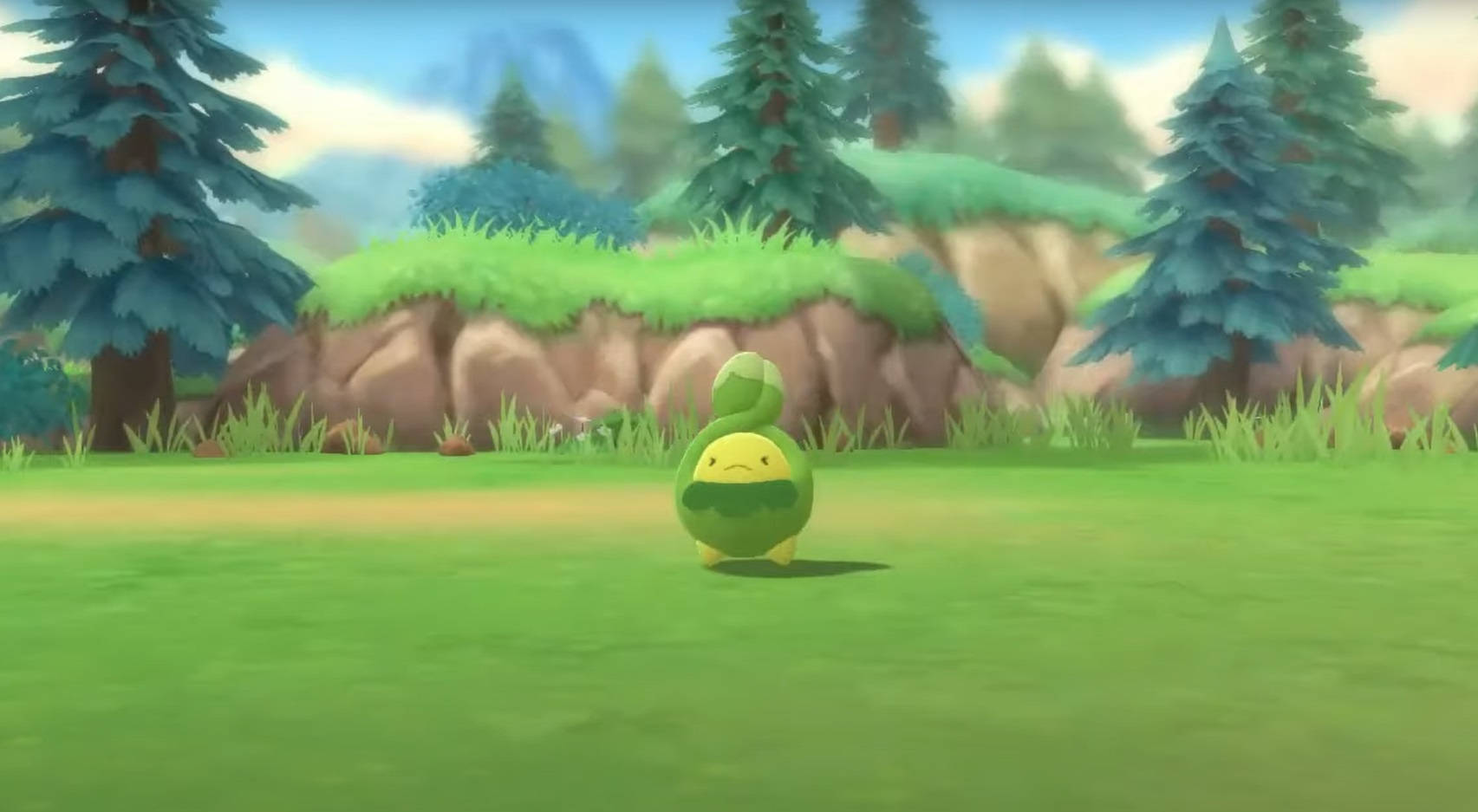 Budew In The Middle Of Grass Field Wallpaper