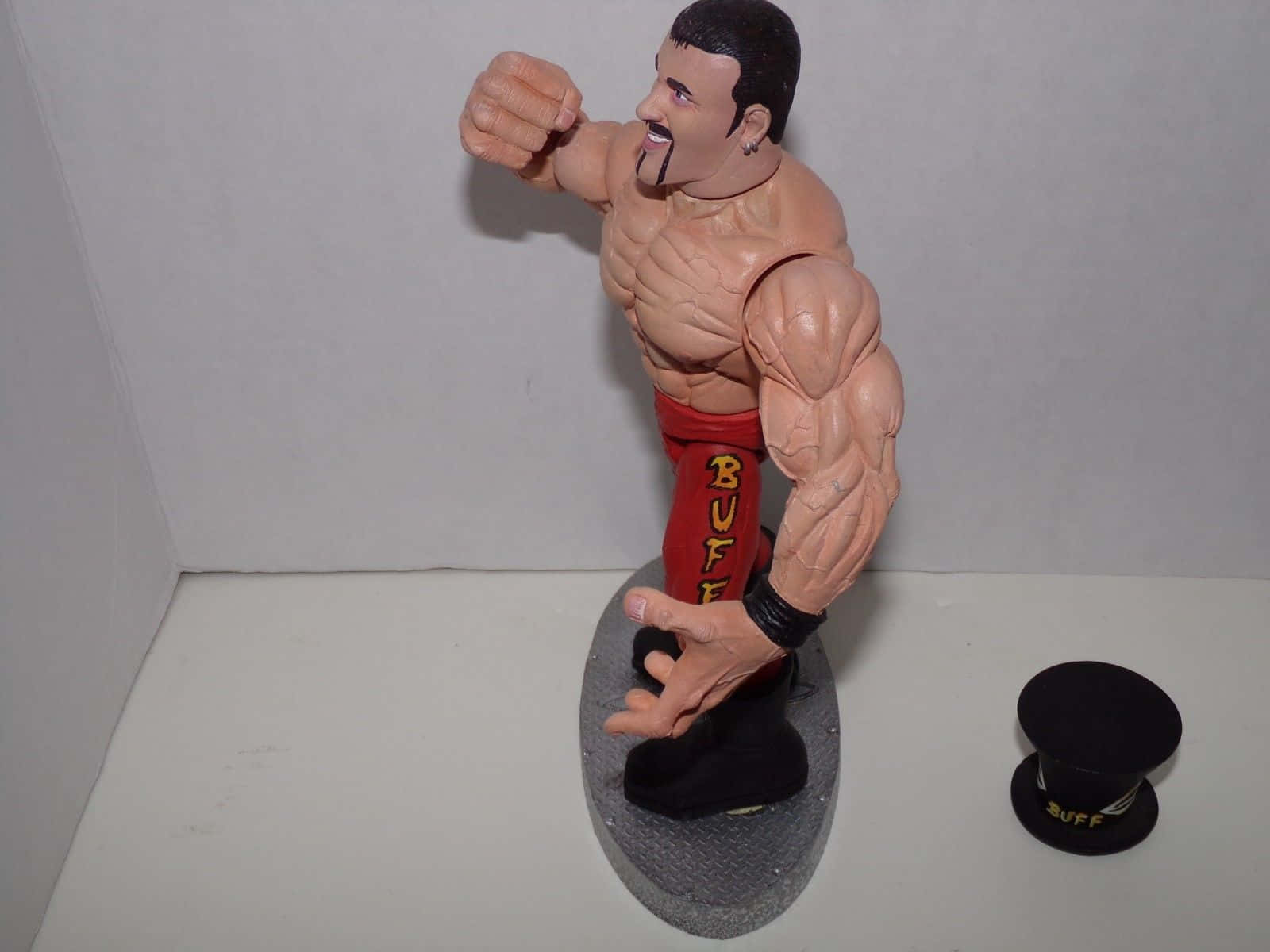 Buff Bagwell Hand Punch Action Figure Photo Wallpaper