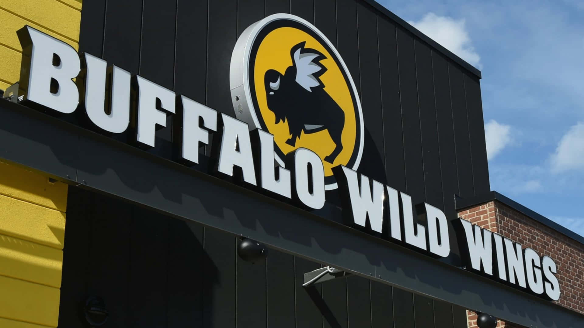Blivklar Til At Nyde Smagen Af Buffalo Wild Wings.