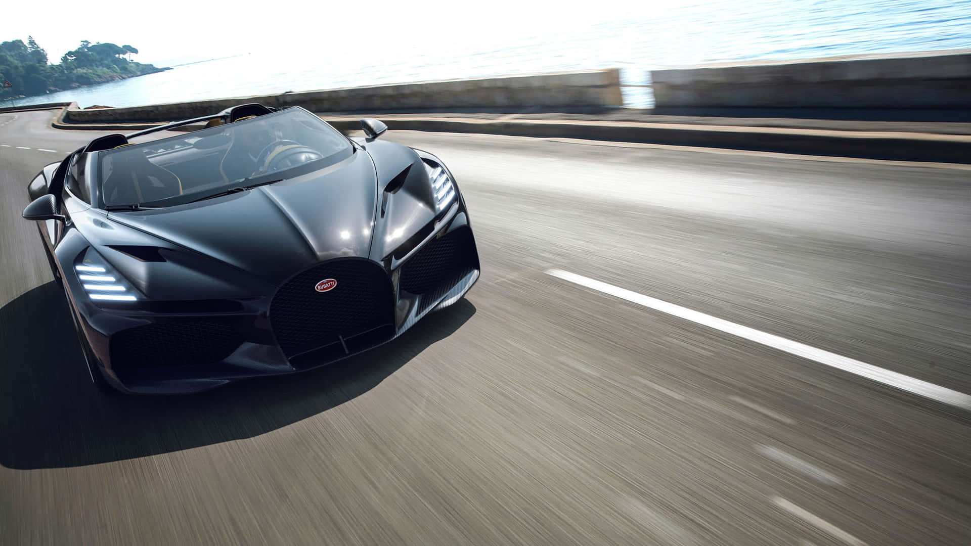 'Unlock the Thrill - Experience the Joy of Driving with the Bugatti' Wallpaper
