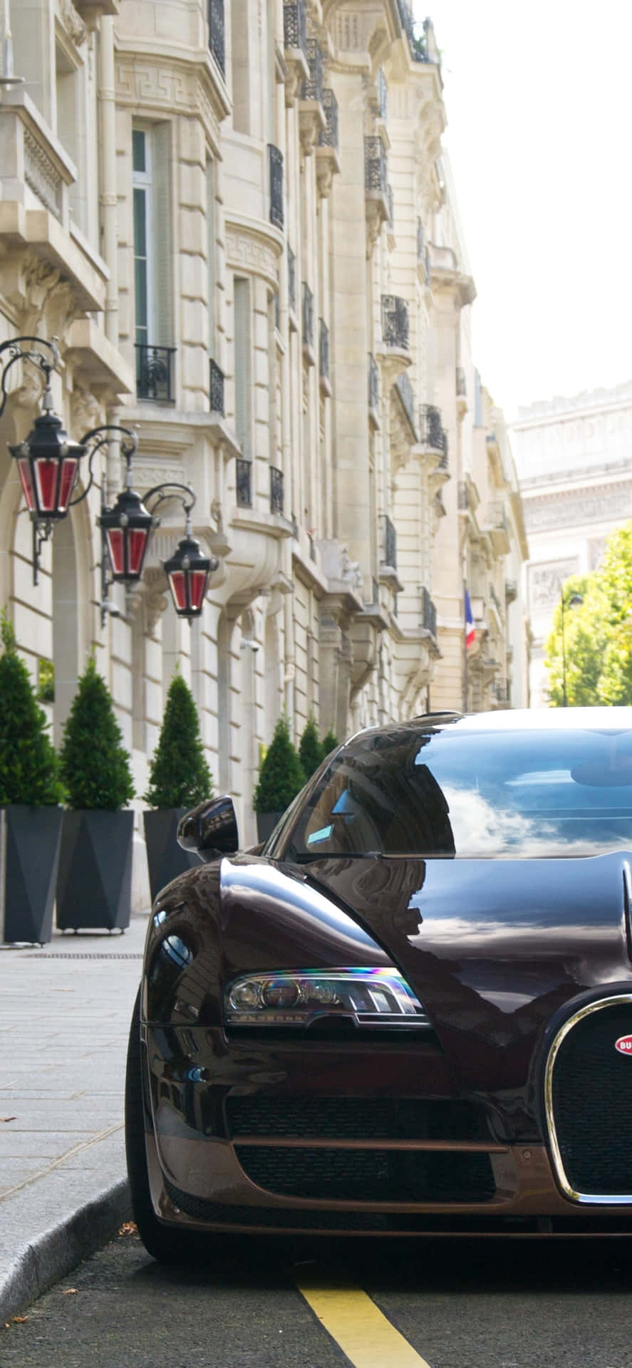 A Bugatti Veyron Parked On The Street Wallpaper