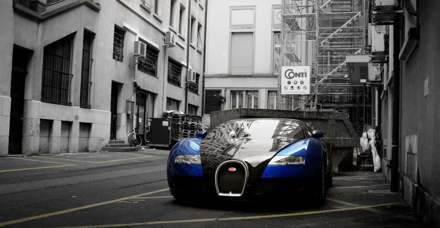 A sleek Bugatti Veyron showcasing its aerodynamic design and luxurious style Wallpaper