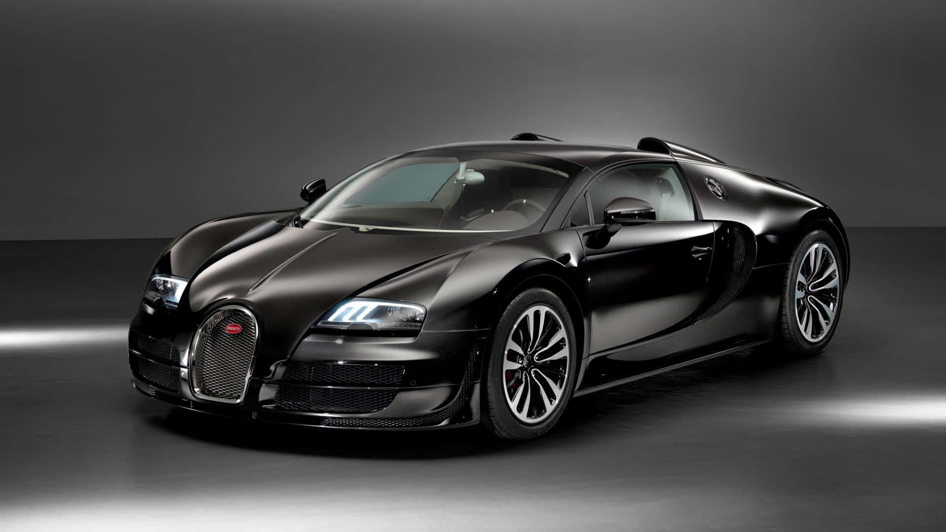Bugatti Veyron effortlessly displaying speed, luxury, and class. Wallpaper