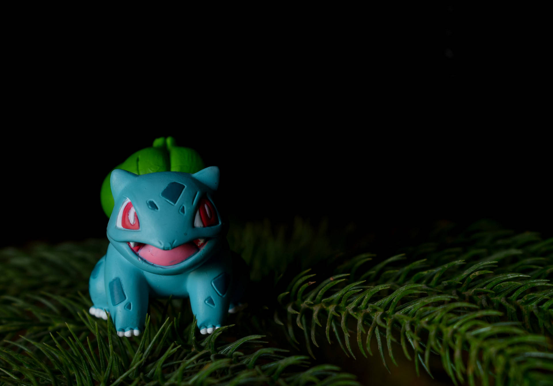 Bulbasaur Toy In Pine Background