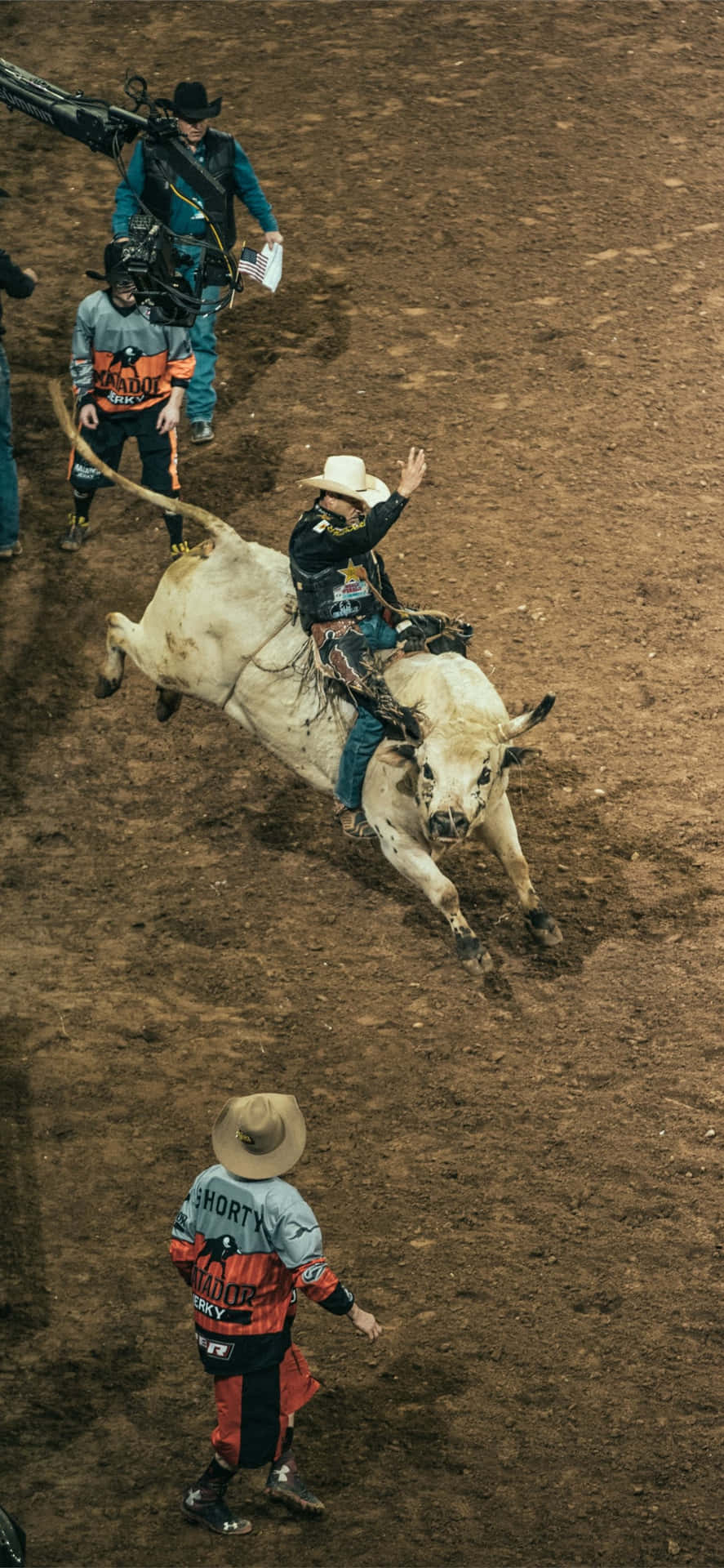 Professional bull rider competing at an event