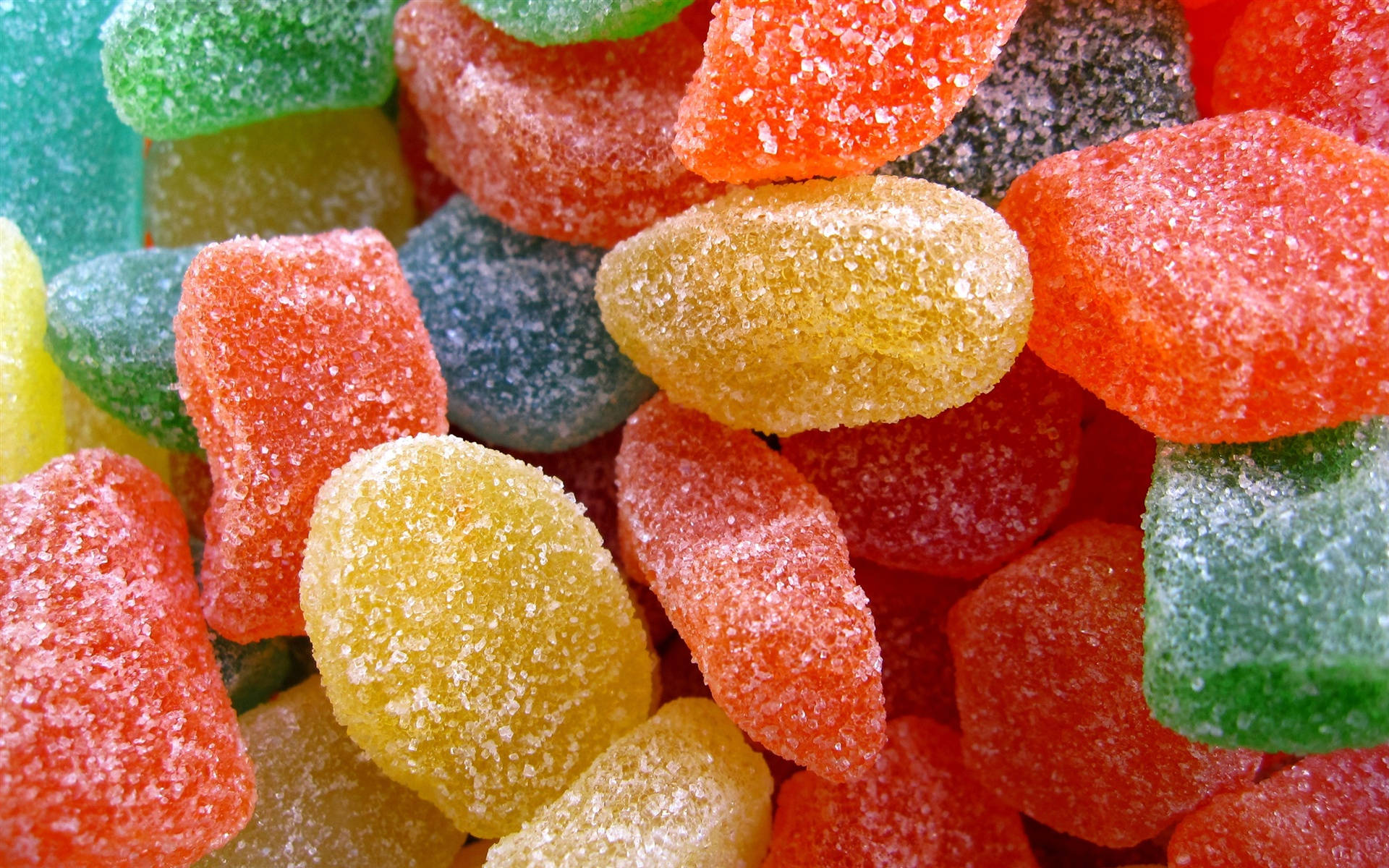 Montónde Caramelos De Azúcar En Multicolor. Fondo de pantalla