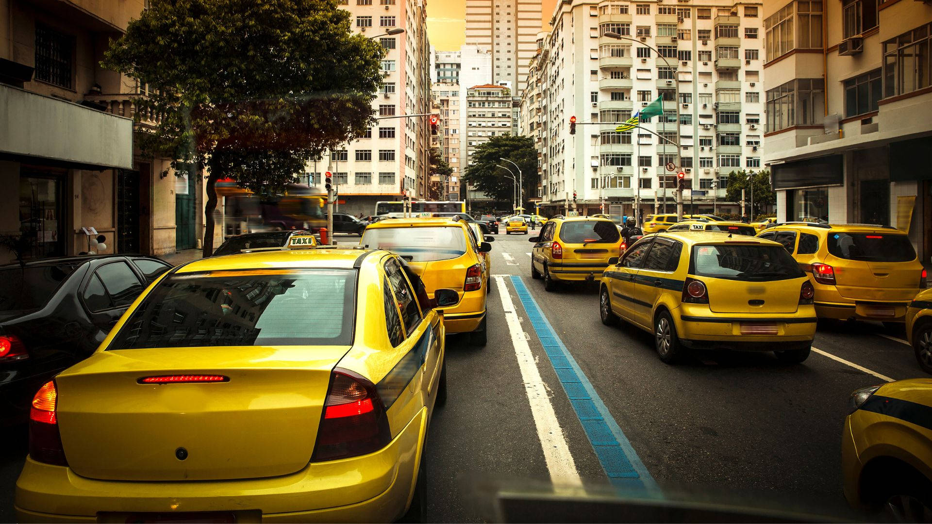 Bunch Of Taxi In Red Traffic Light Wallpaper