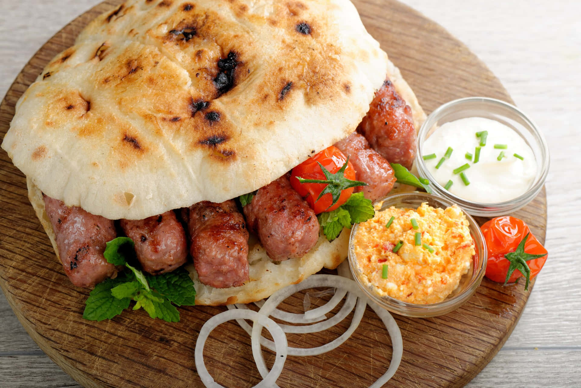 Traditional Cevapi Burger with Fresh Tomatoes Wallpaper
