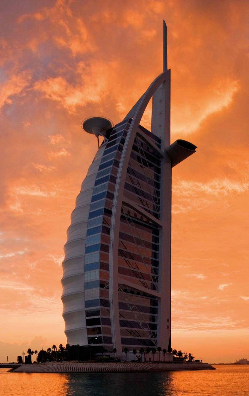 Atardecercielo Del Burj Al Arab Para Iphone. Fondo de pantalla