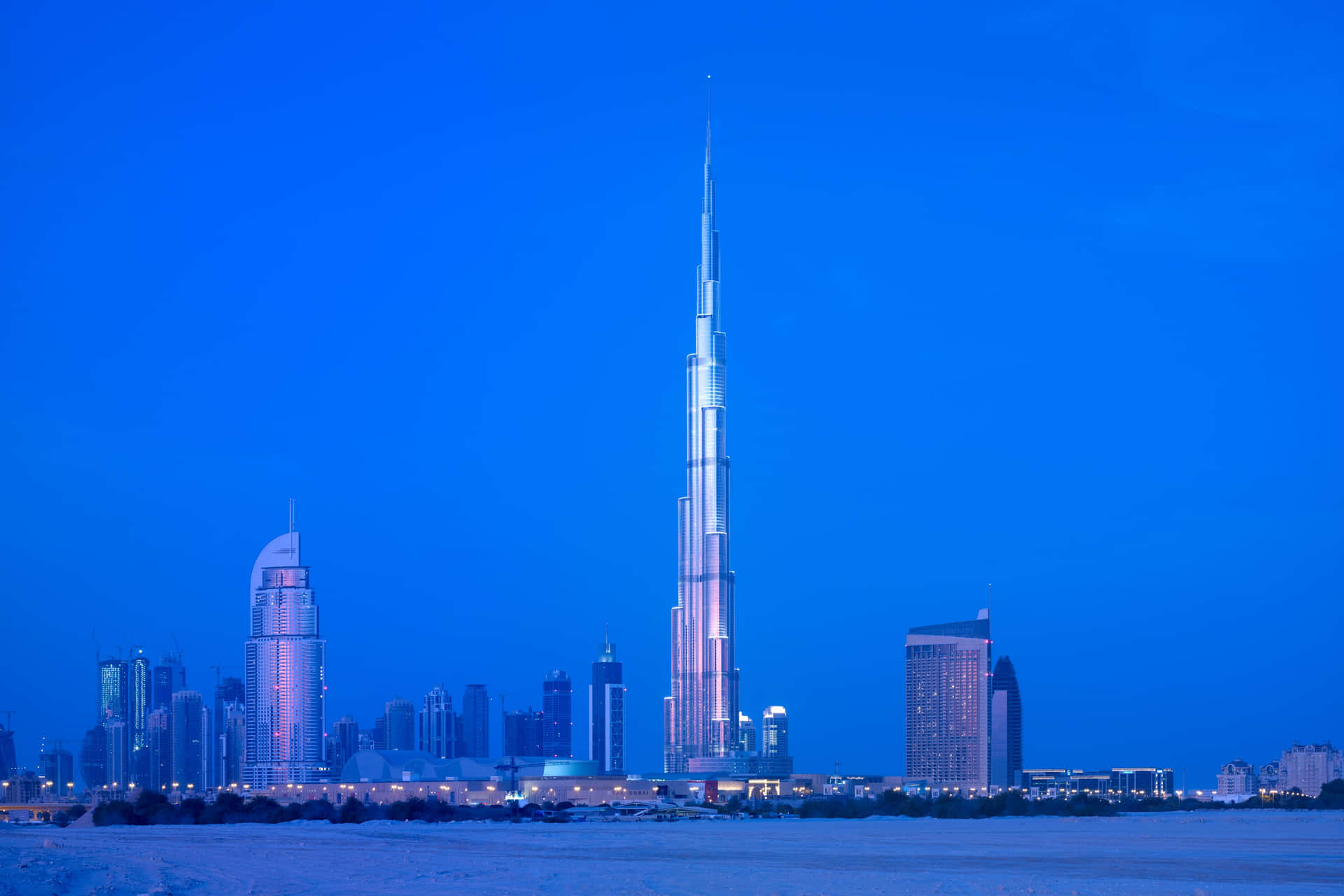 Majestic Burj Khalifa dominating the Dubai skyline at sunset