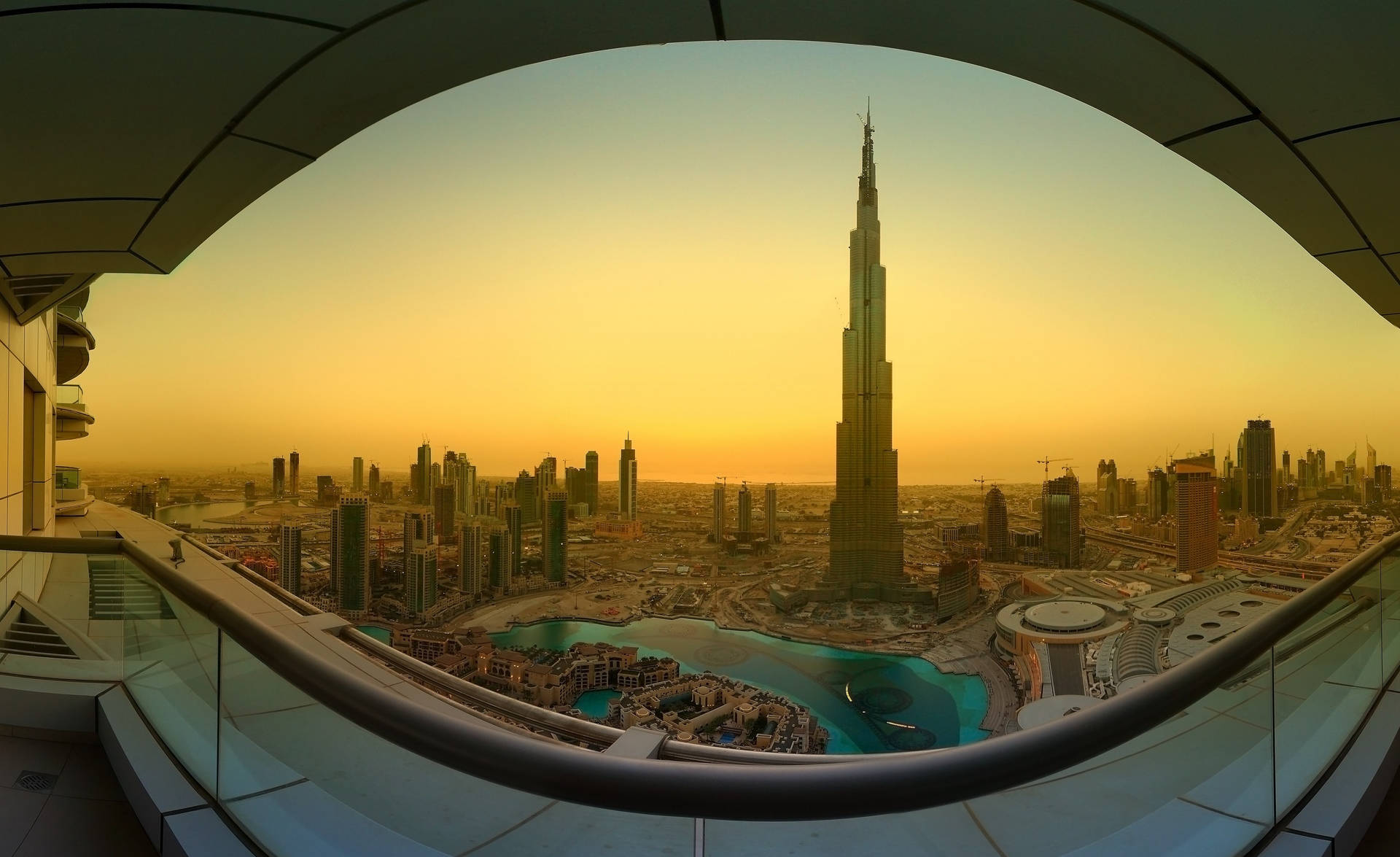 Exquisite Sunrise Reflected in Burj Khalifa Wallpaper