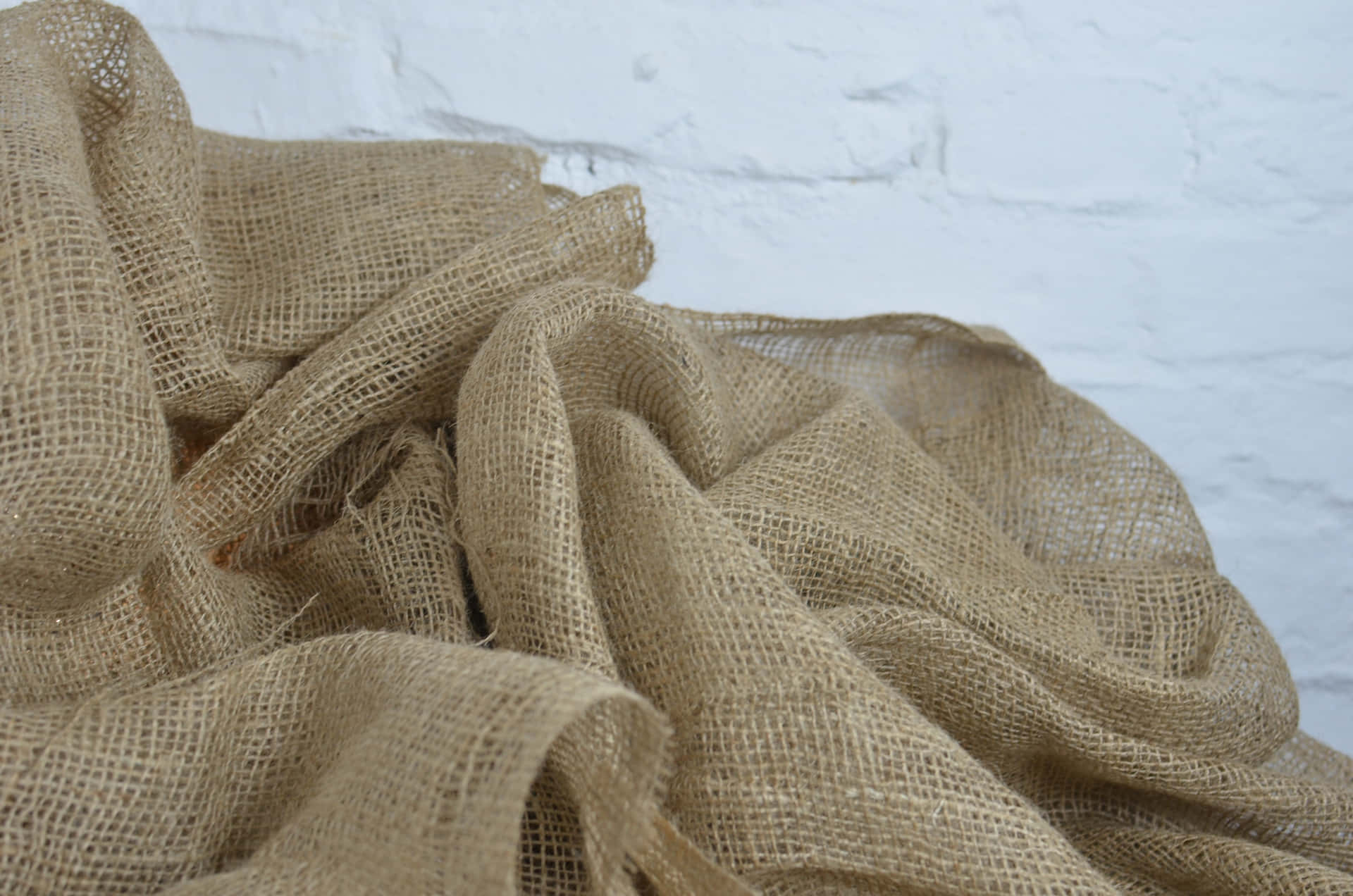 Textured burlap canvas with a rustic and natural feel.