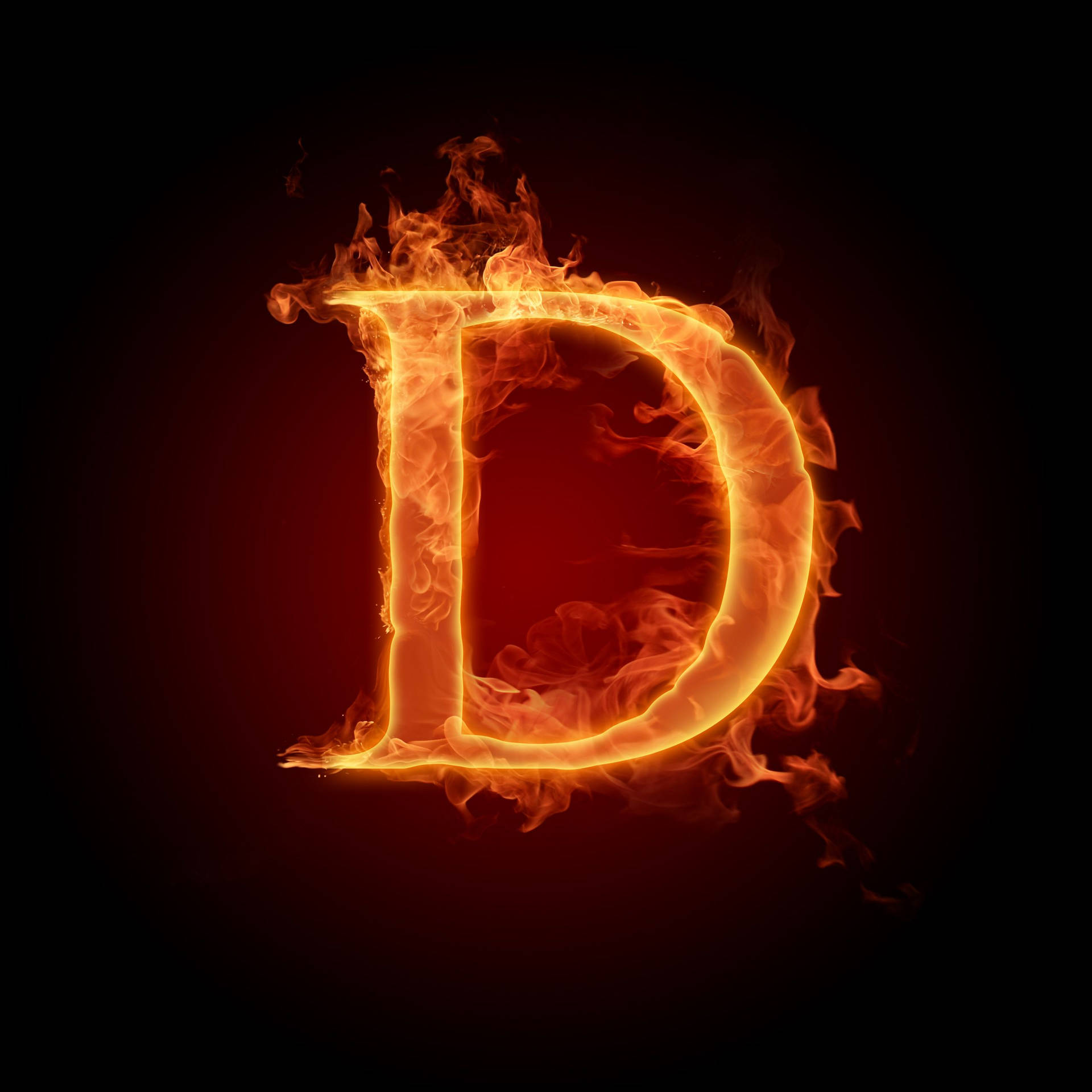 Burning Letter D In The Dark Background