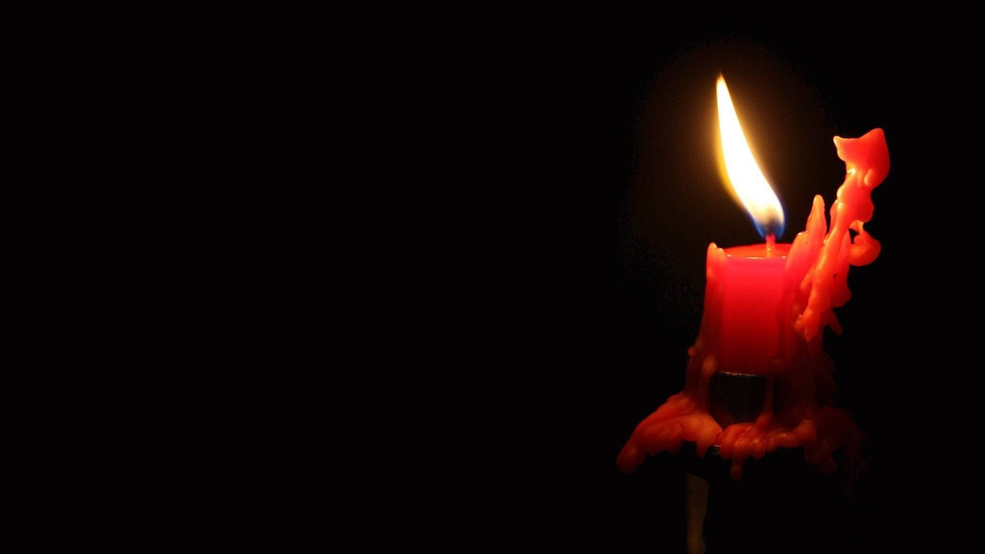 Burning Red Candle Wallpaper