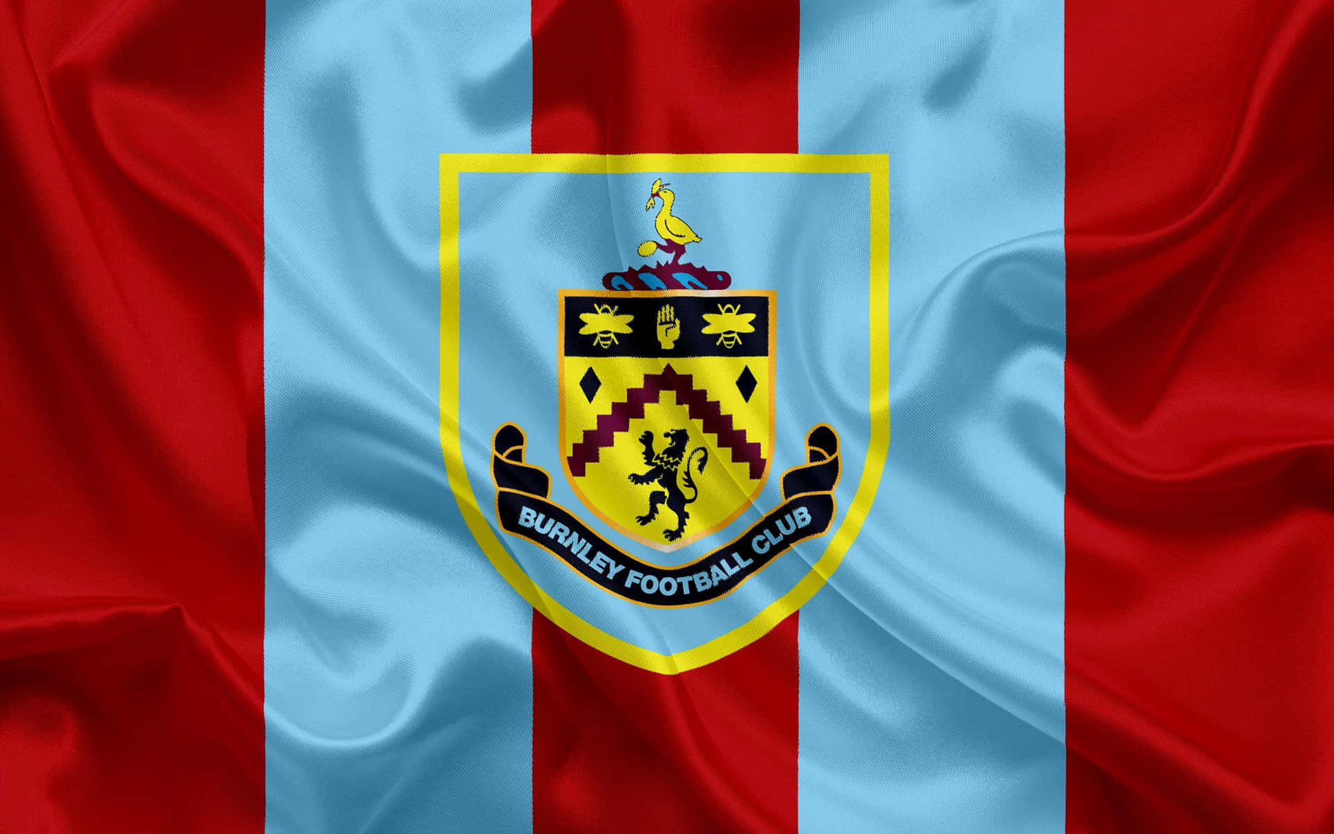 Burnley FC Crest on a Blue Background Wallpaper