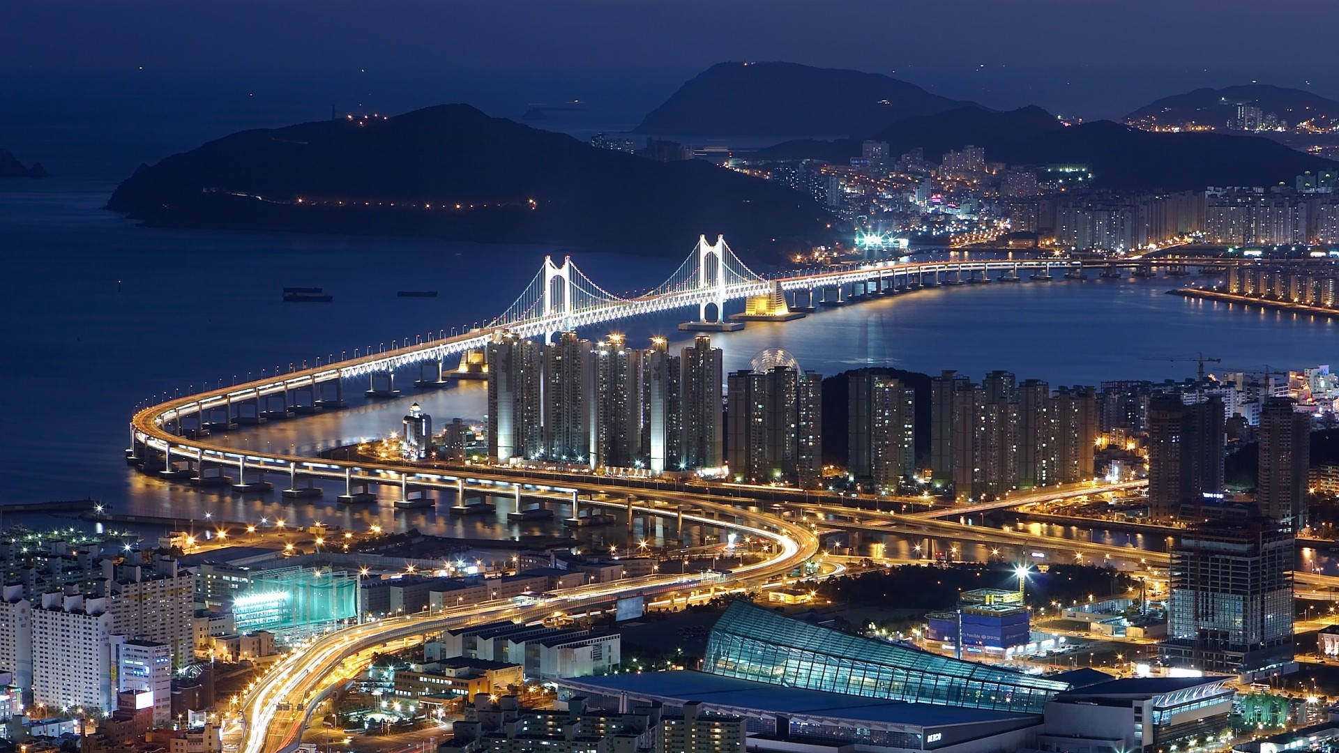 Caption: "Spectacular Evening View of Busan City Bridge, South Korea" Wallpaper
