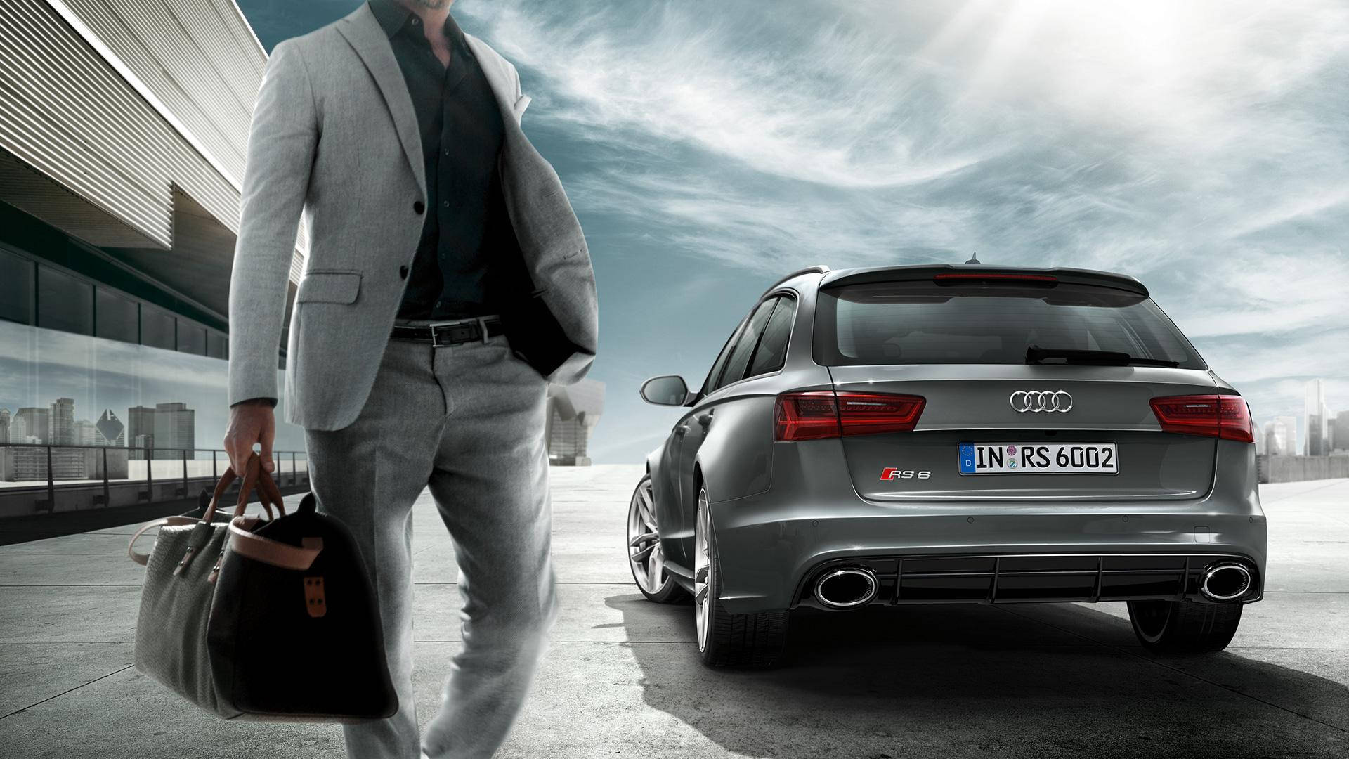 En forretningsmand og hans Audi RS7 Sportback Wallpaper