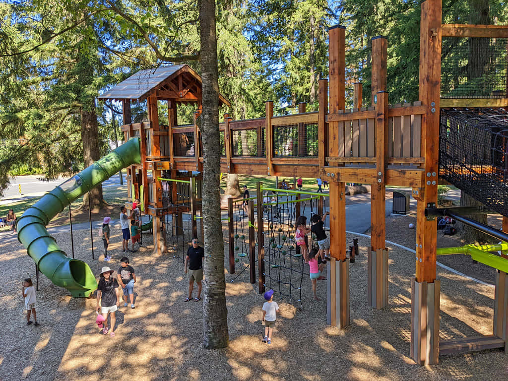 Bustling Playground Sunny Day Coquitlam Wallpaper