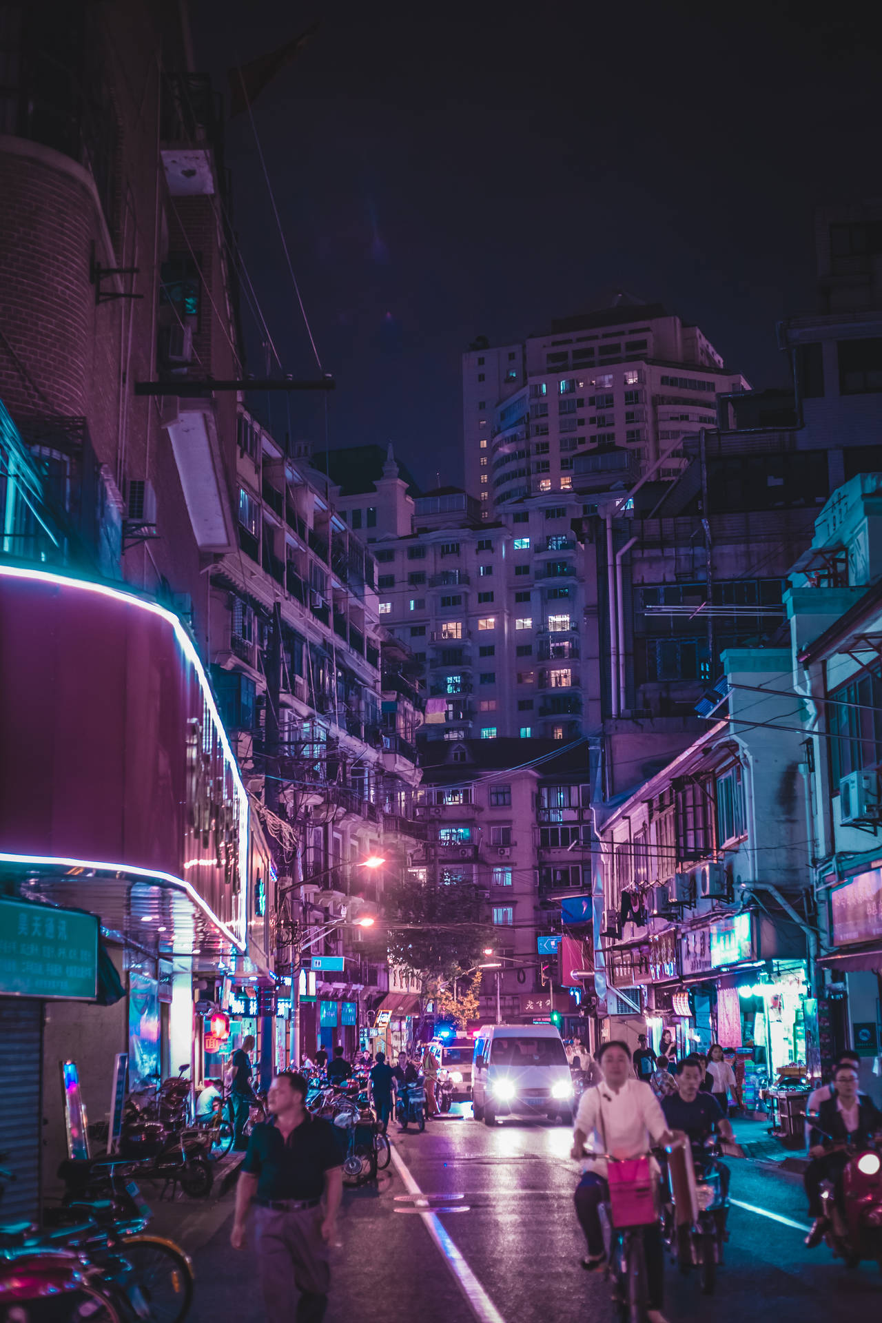 Busy Street With Light Purple Lights Wallpaper
