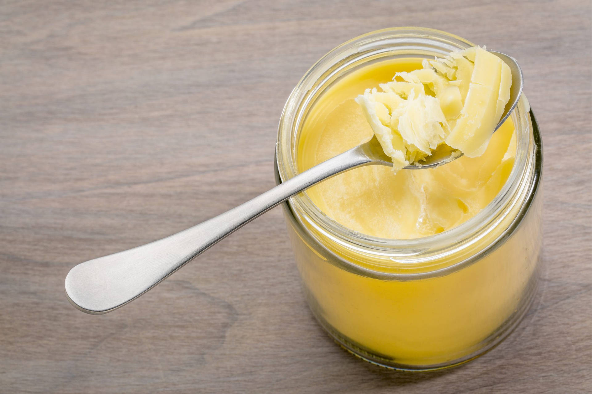 Butter Jar With Spoon Wallpaper