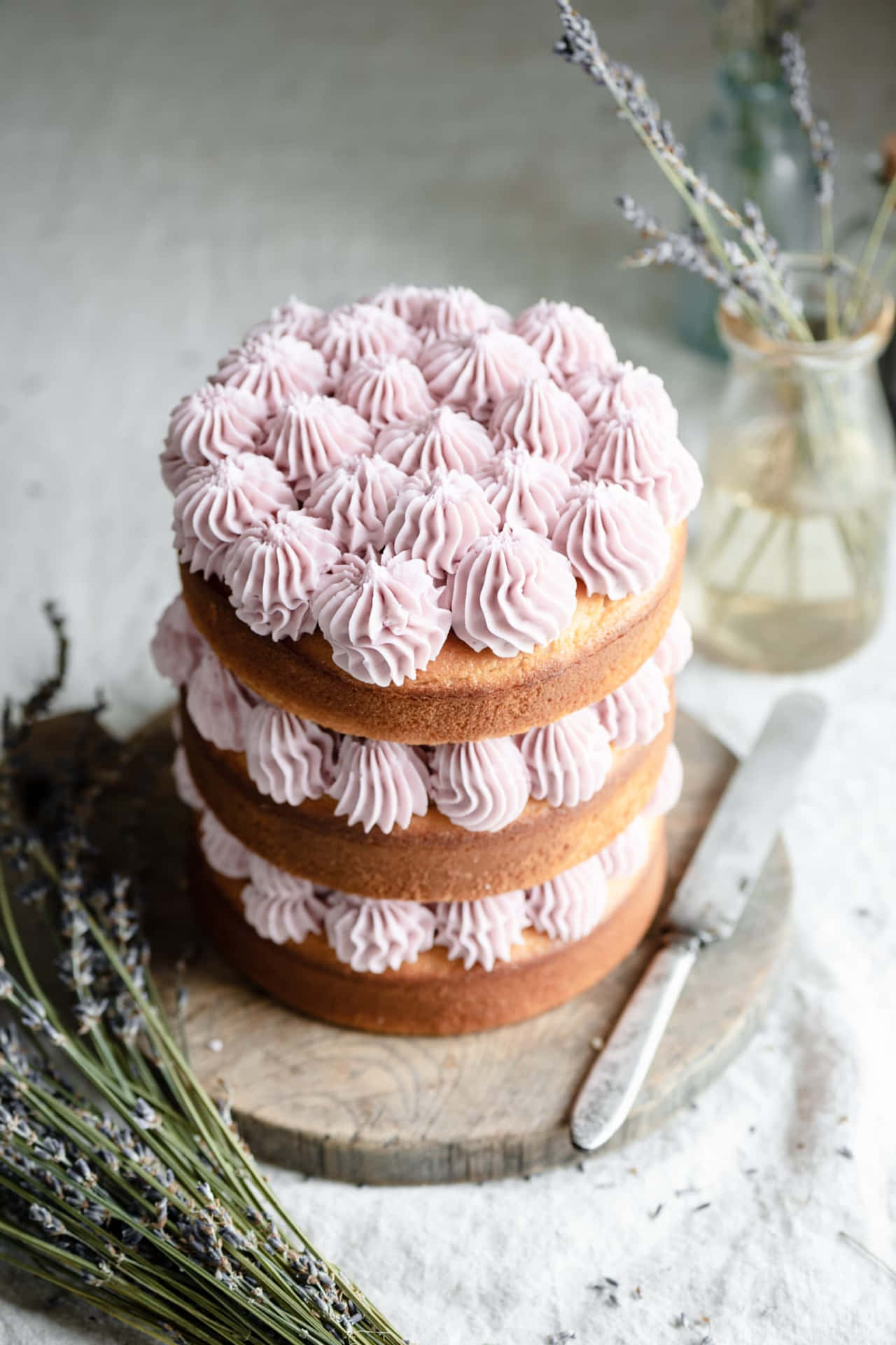 Freshly Baked Vanilla Cupcake with Delicious Buttercream Frosting Wallpaper