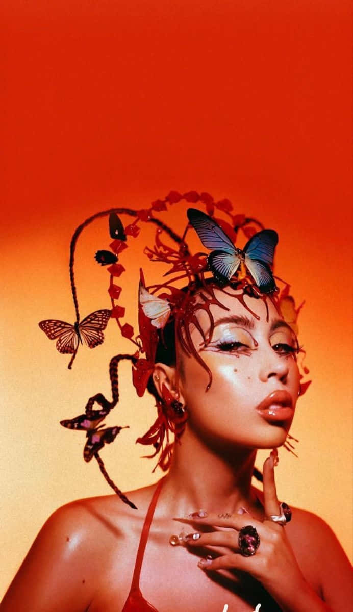 Butterfly Adorned Portrait Kali Uchis Wallpaper
