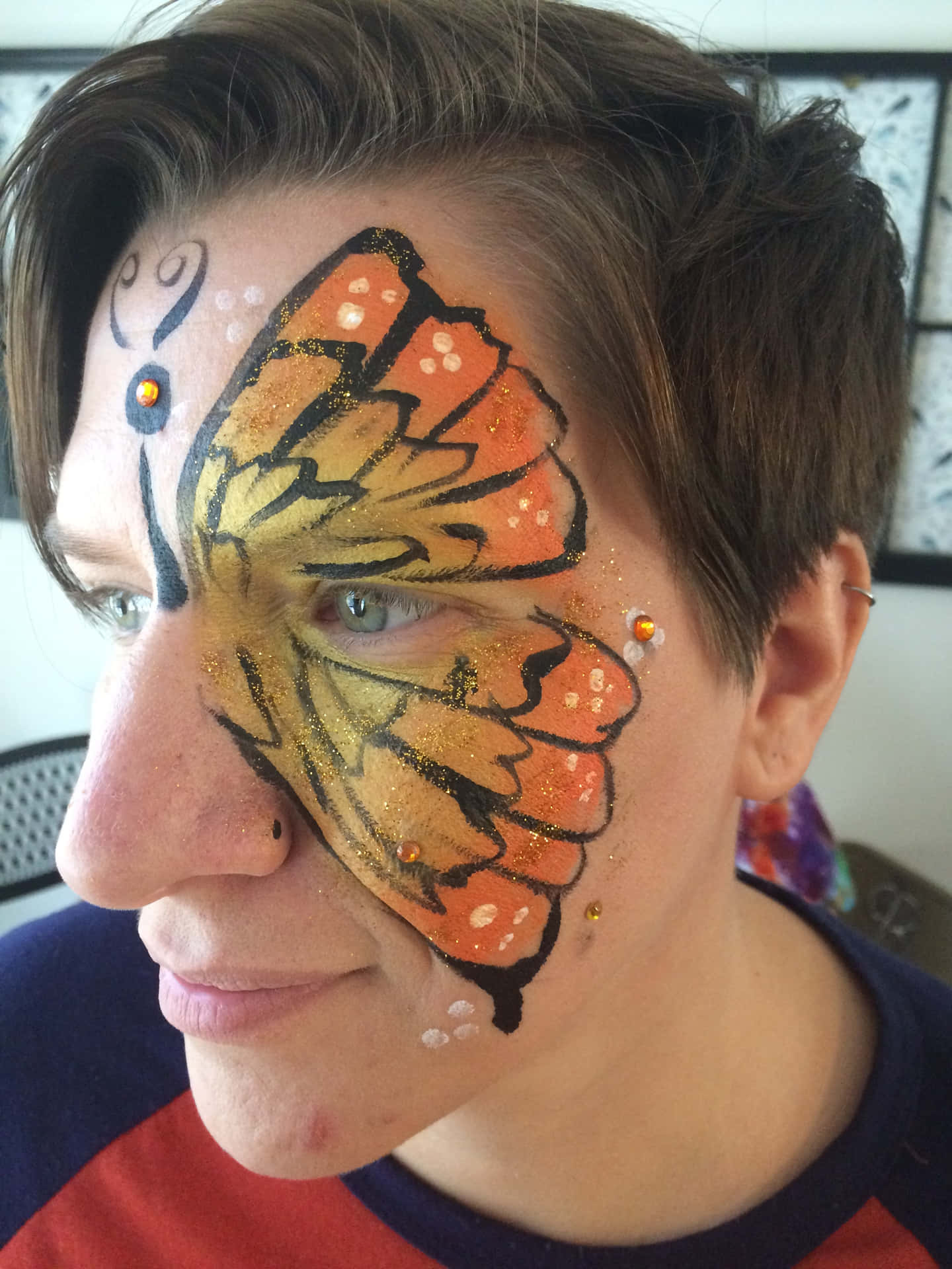 Bright and Colorful Butterfly Face Painting Wallpaper