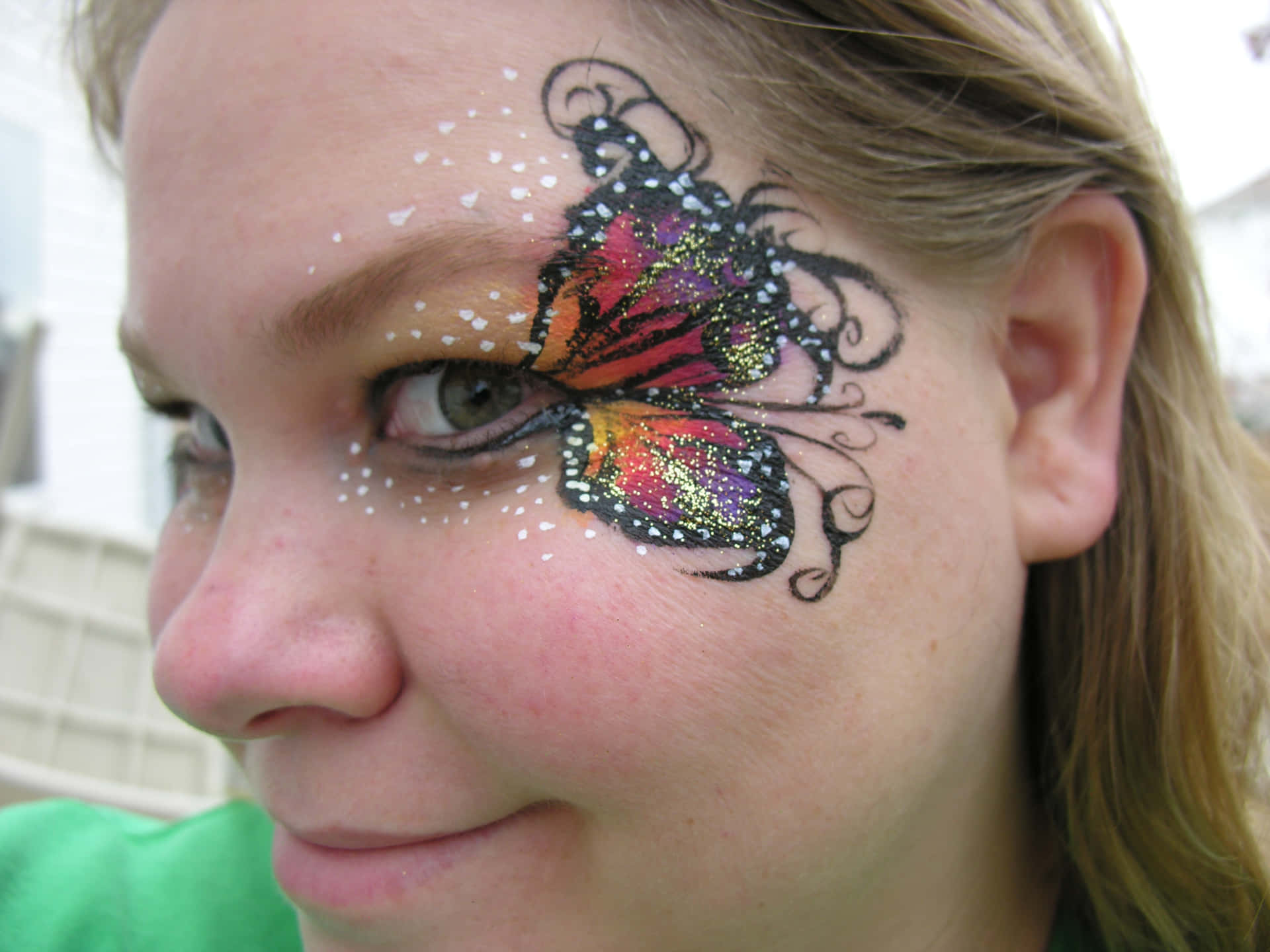 Create a Dazzling Look with Butterfly Face Painting Wallpaper