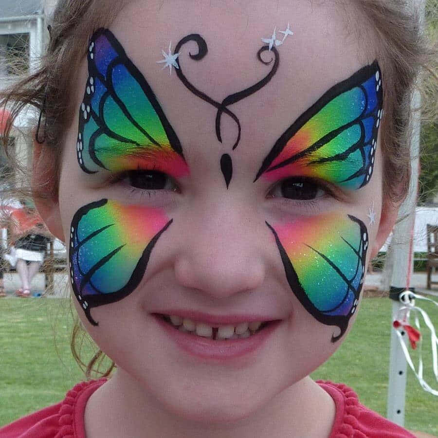 A rainbow of butterflies to brighten your face Wallpaper