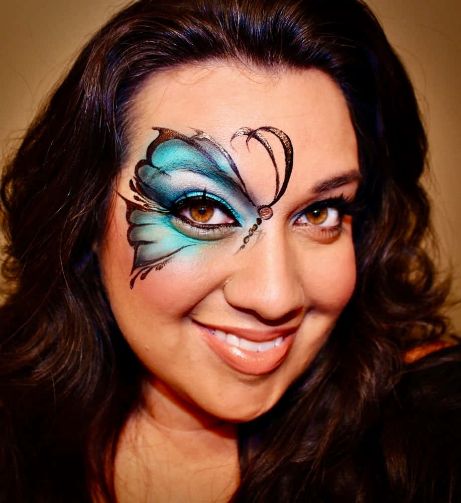 Get Ready To Look Like A Butterfly With Face Painting Wallpaper