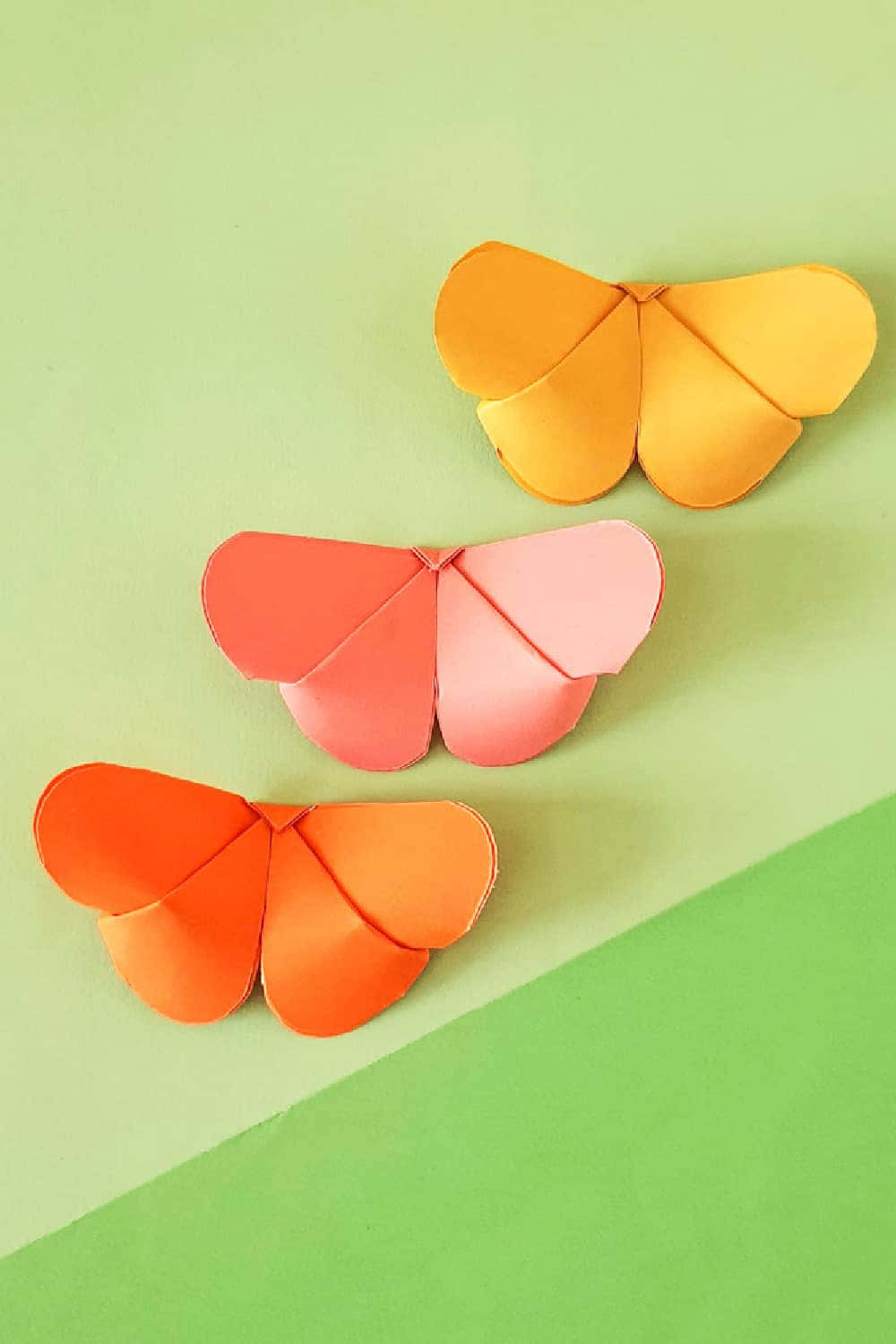 beautiful origami butterfly on pink background Wallpaper