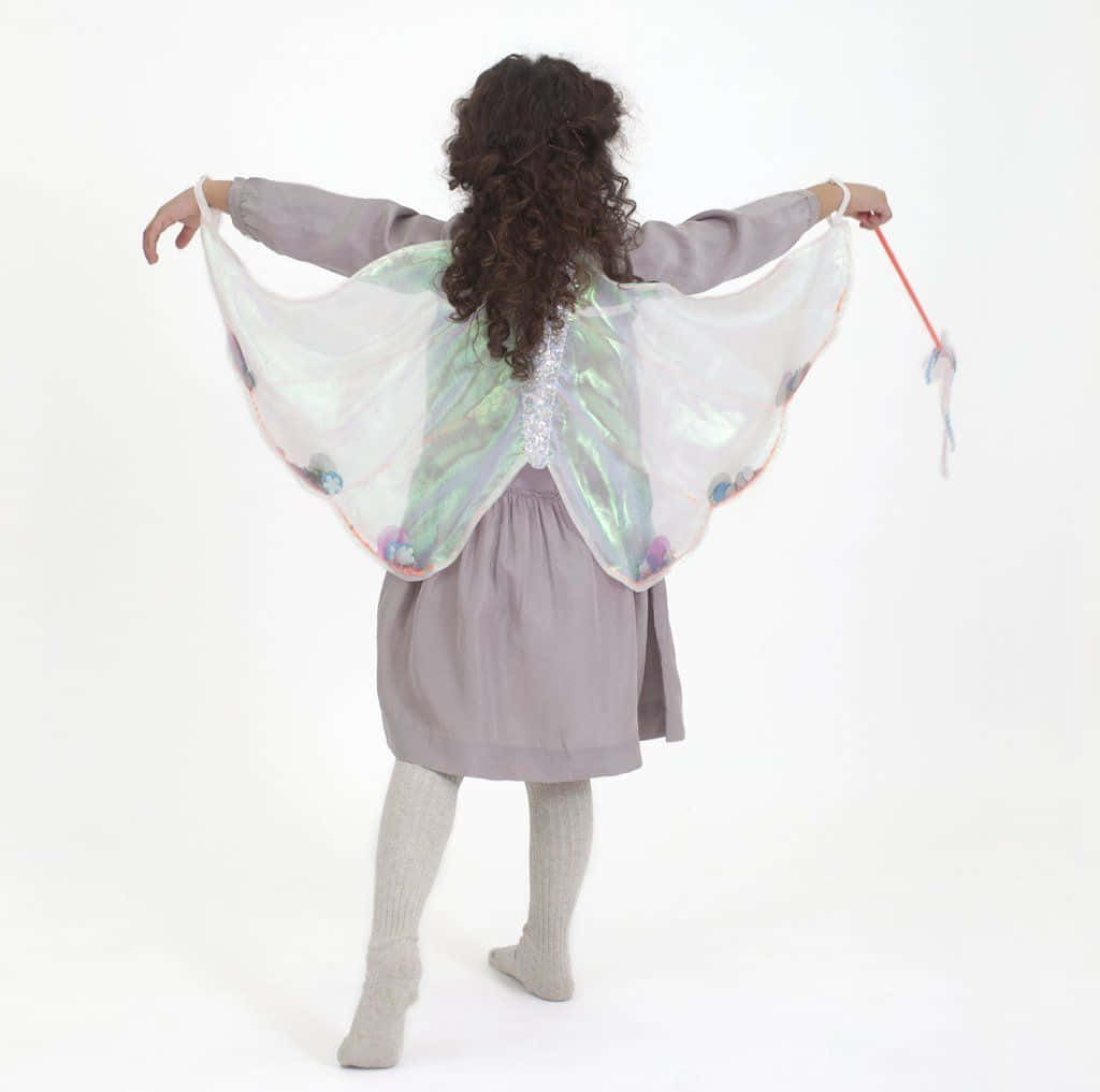 Stunning Butterfly Wing Dress Add's Glamour to Any Occasion" Wallpaper