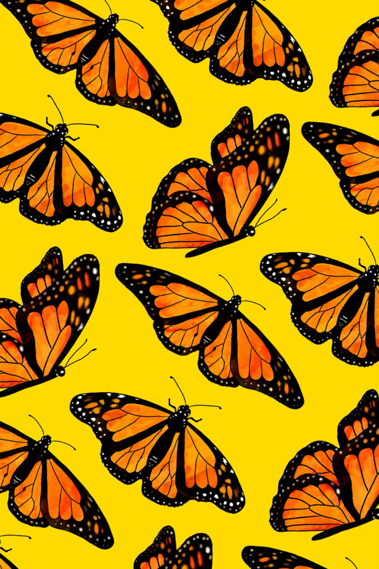 Enjoy the beauty of a vibrant yellow butterfly in nature Wallpaper