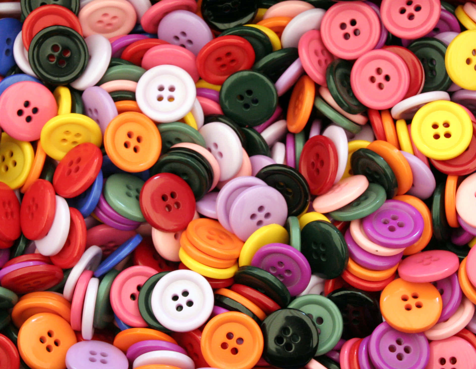 A Pile Of Colorful Buttons