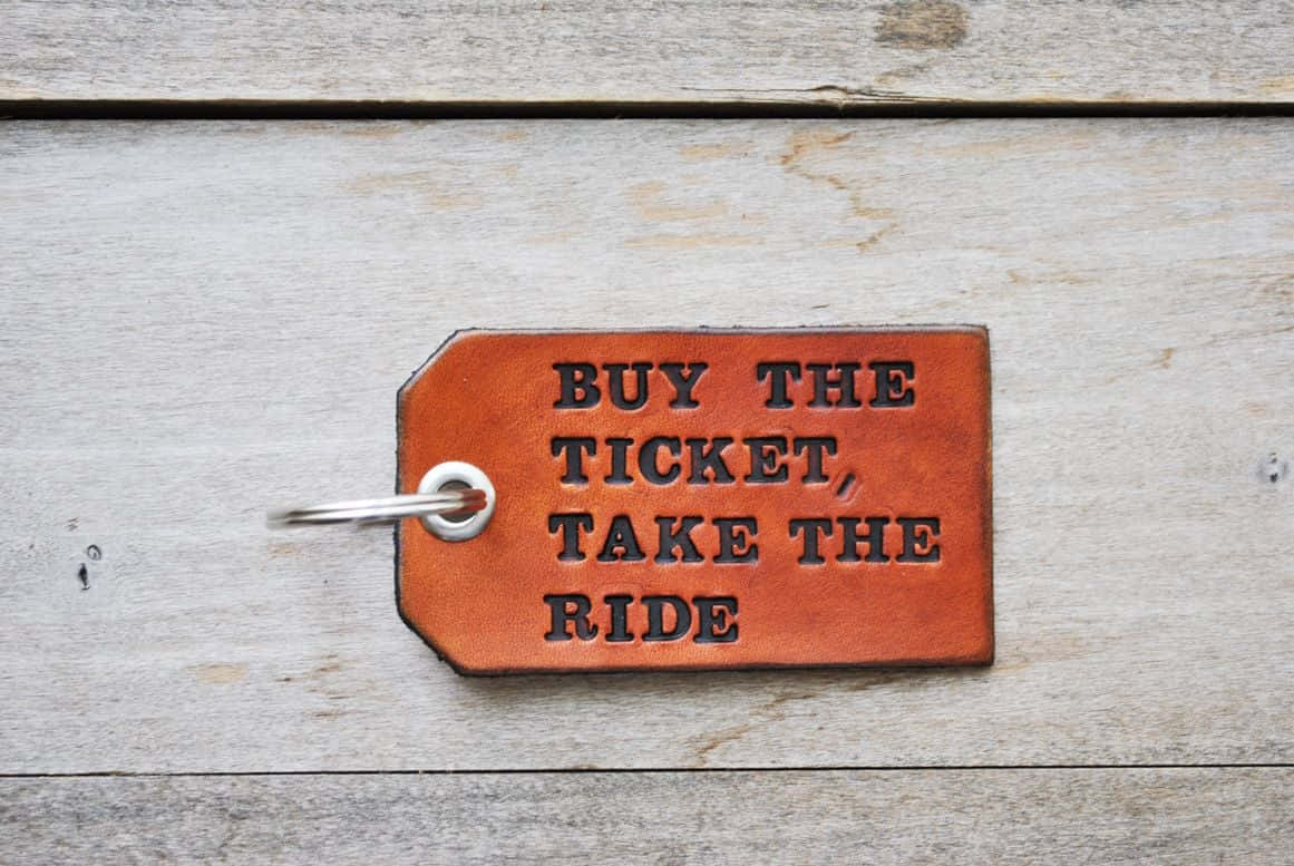 Buy The Ticket_ Take The Ride_ Travel Quote Wallpaper