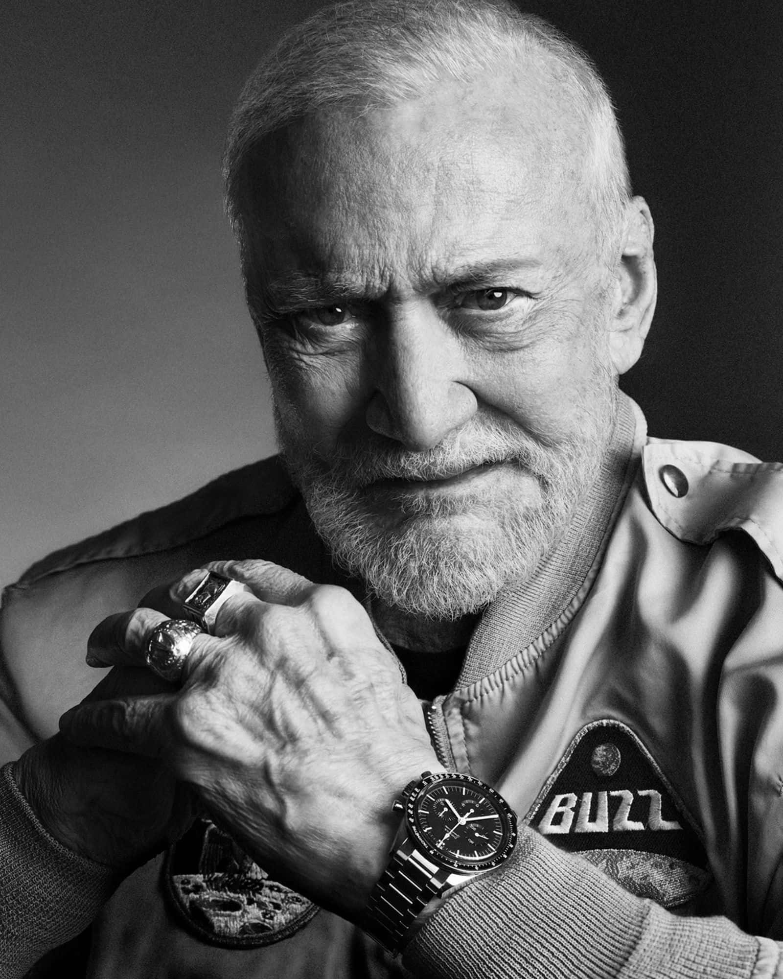 Buzz Aldrin Is Standing On The Moon’s Surface During The Apollo 11 Mission Wallpaper