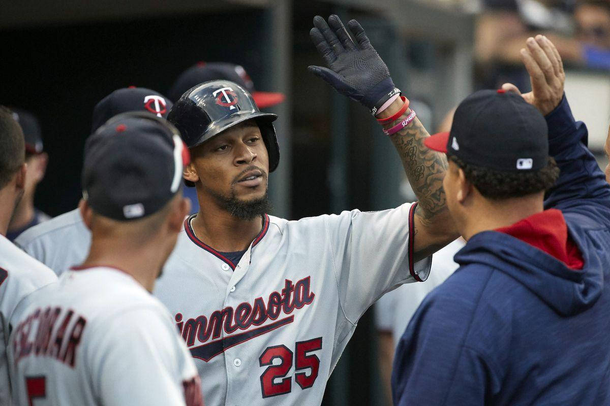 Byron Buxton High Five With Teammates Wallpaper