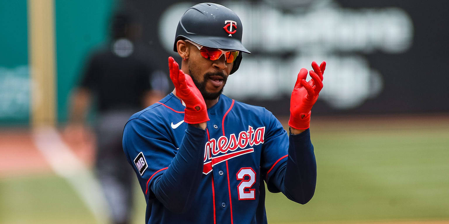 Download Byron Buxton Wearing Red Gloves Wallpaper