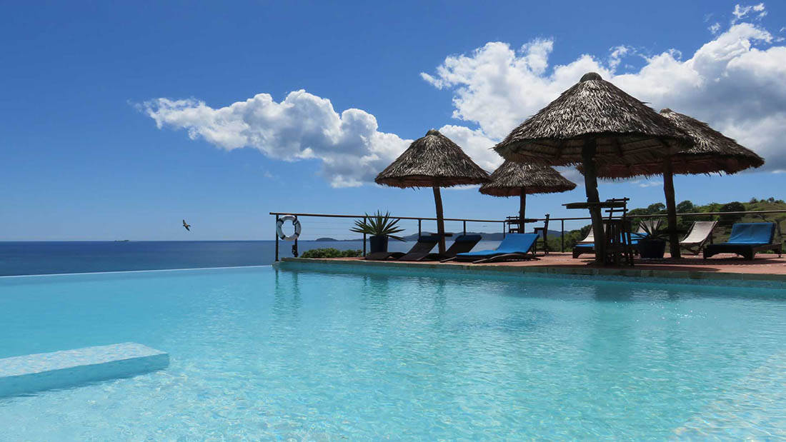 Download Stunning Beach Cabanas in Madagascar Wallpaper | Wallpapers.com