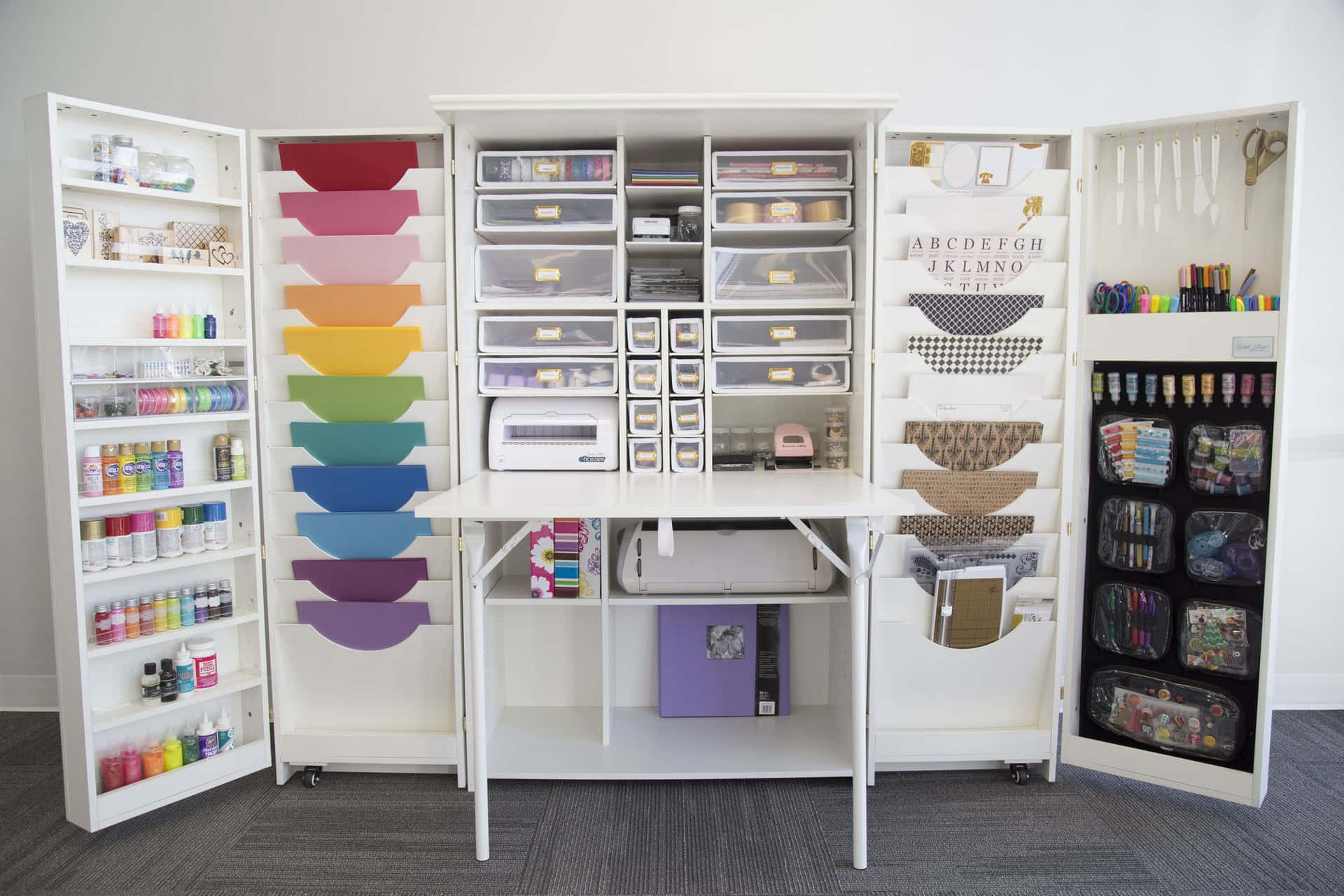 A White Craft Cabinet With Many Different Supplies