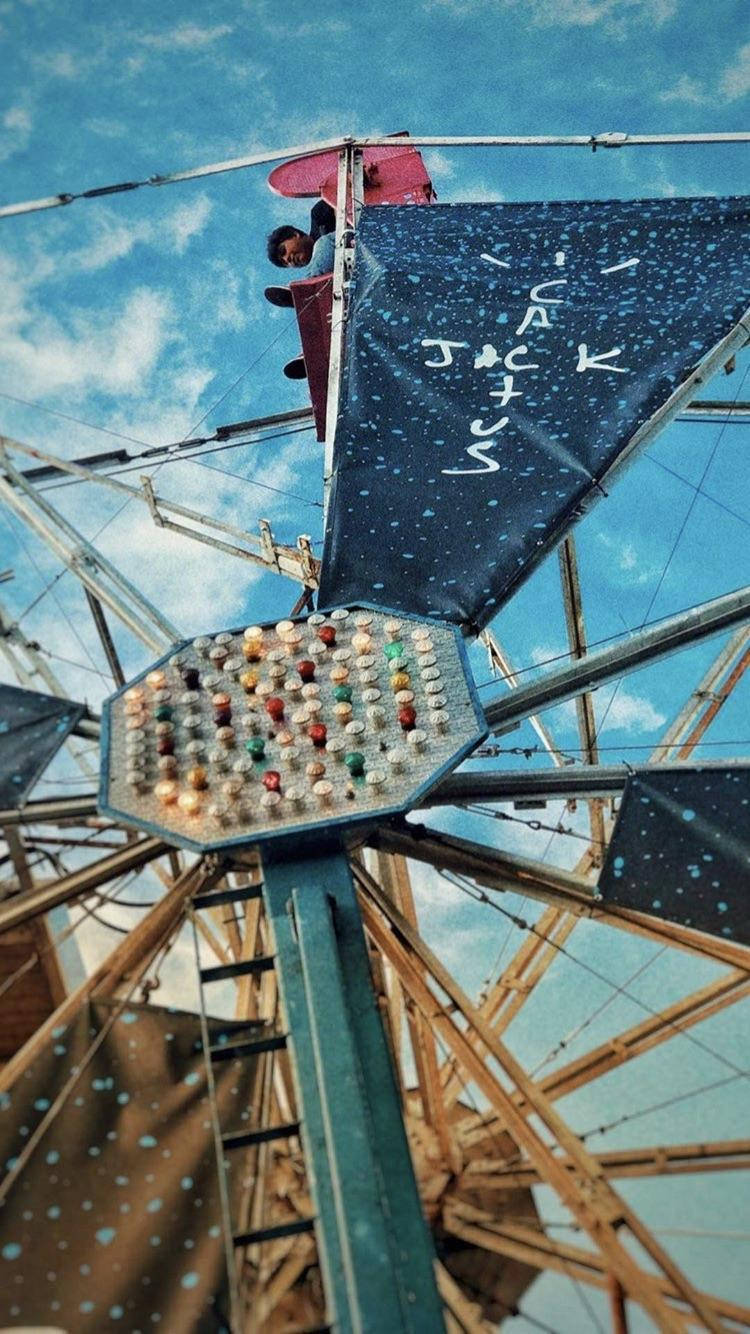 Cactus Jack Travis Scott Logo On Ferris Wheel Wallpaper