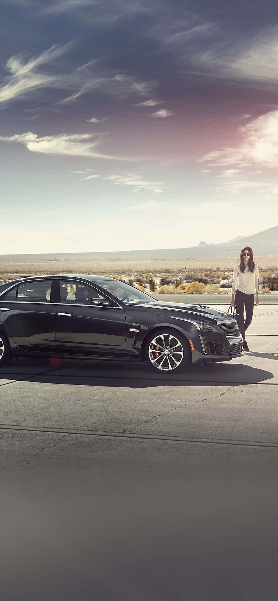 Sleek Silver Cadillac CTS on a Scenic Road Wallpaper