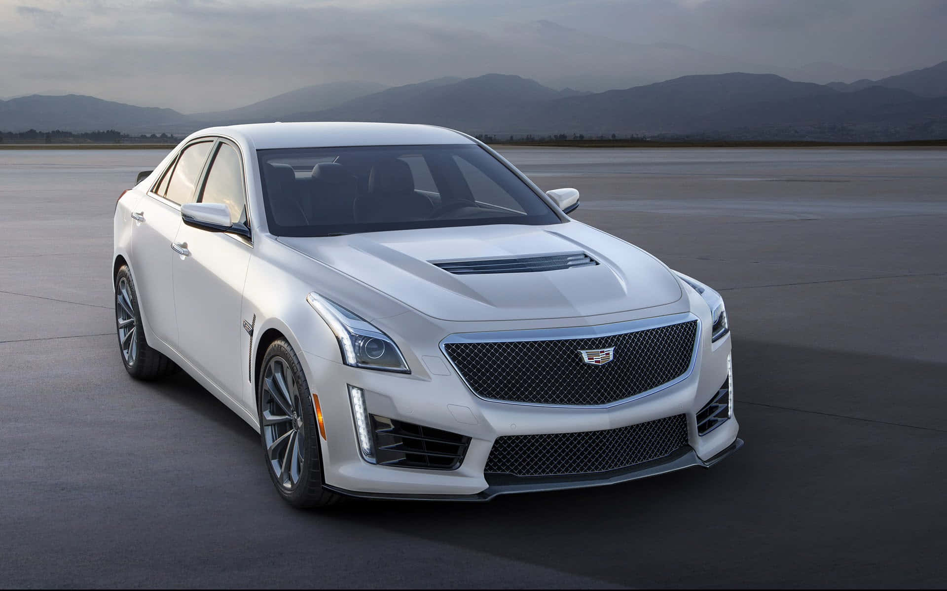 Stunning and Sleek Cadillac CTS in a Scenic Outdoor Setting Wallpaper