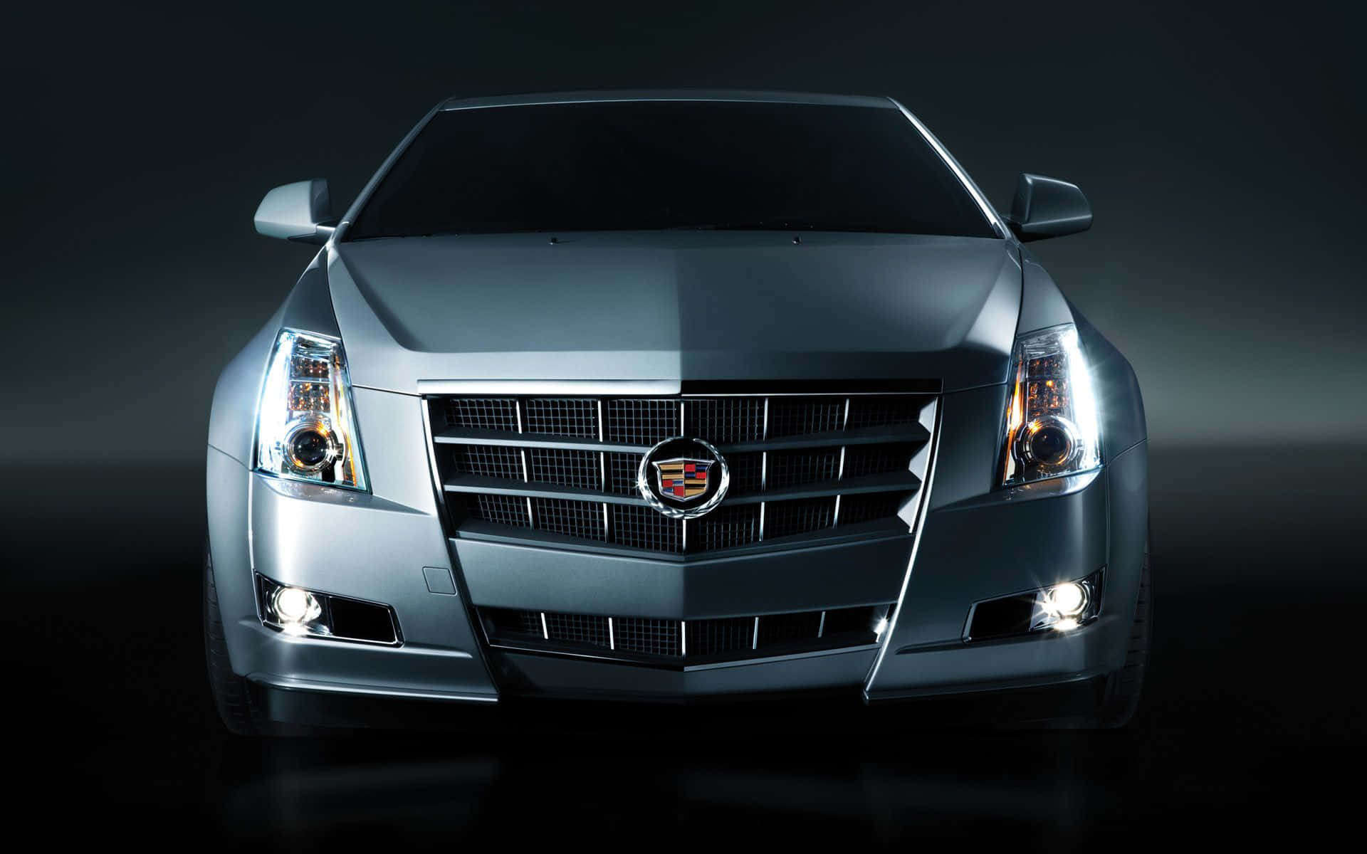 Sleek Silver Cadillac CTS on the Road Wallpaper