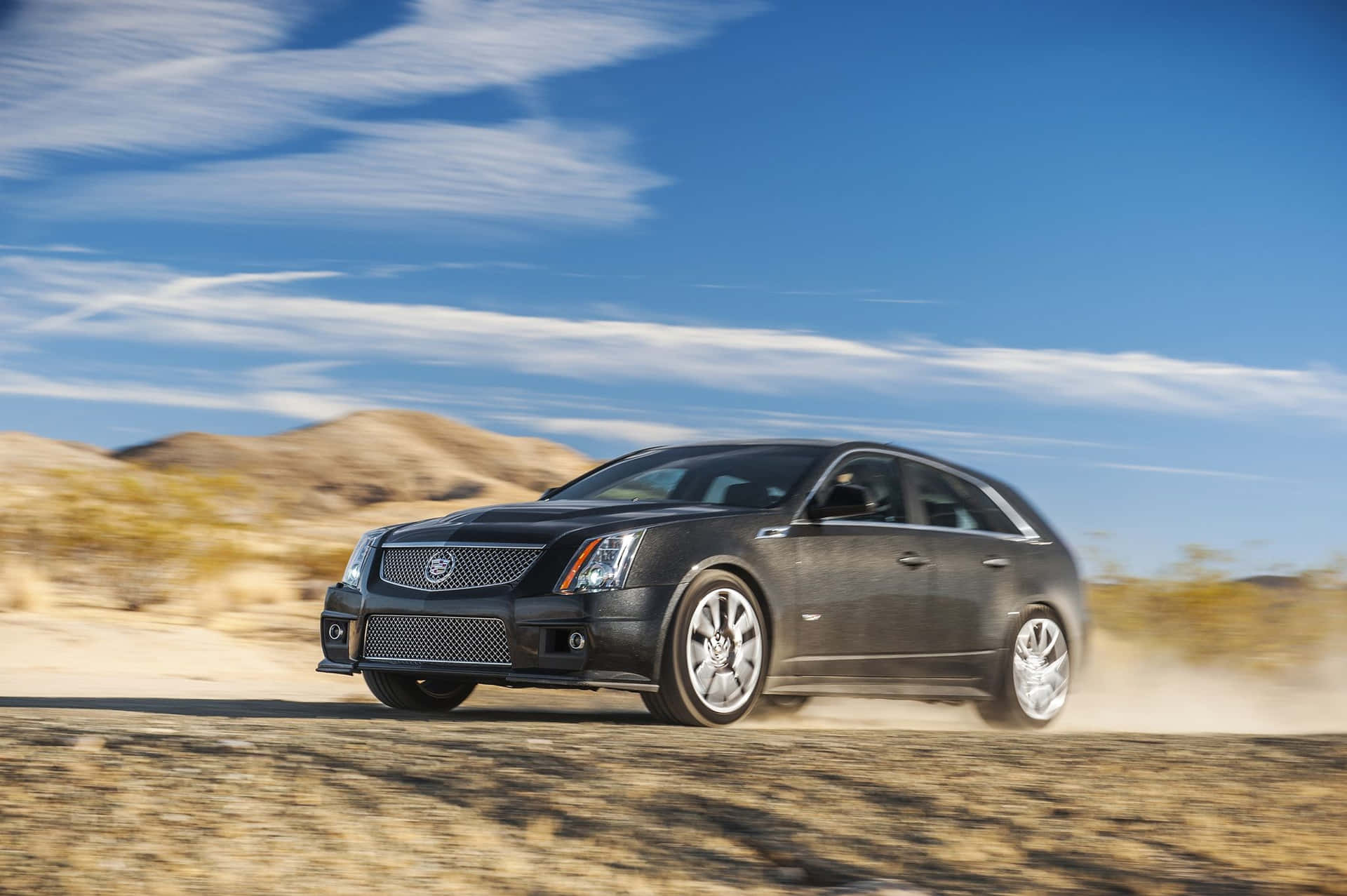 Sleek and Stylish Cadillac CTS on the Road Wallpaper