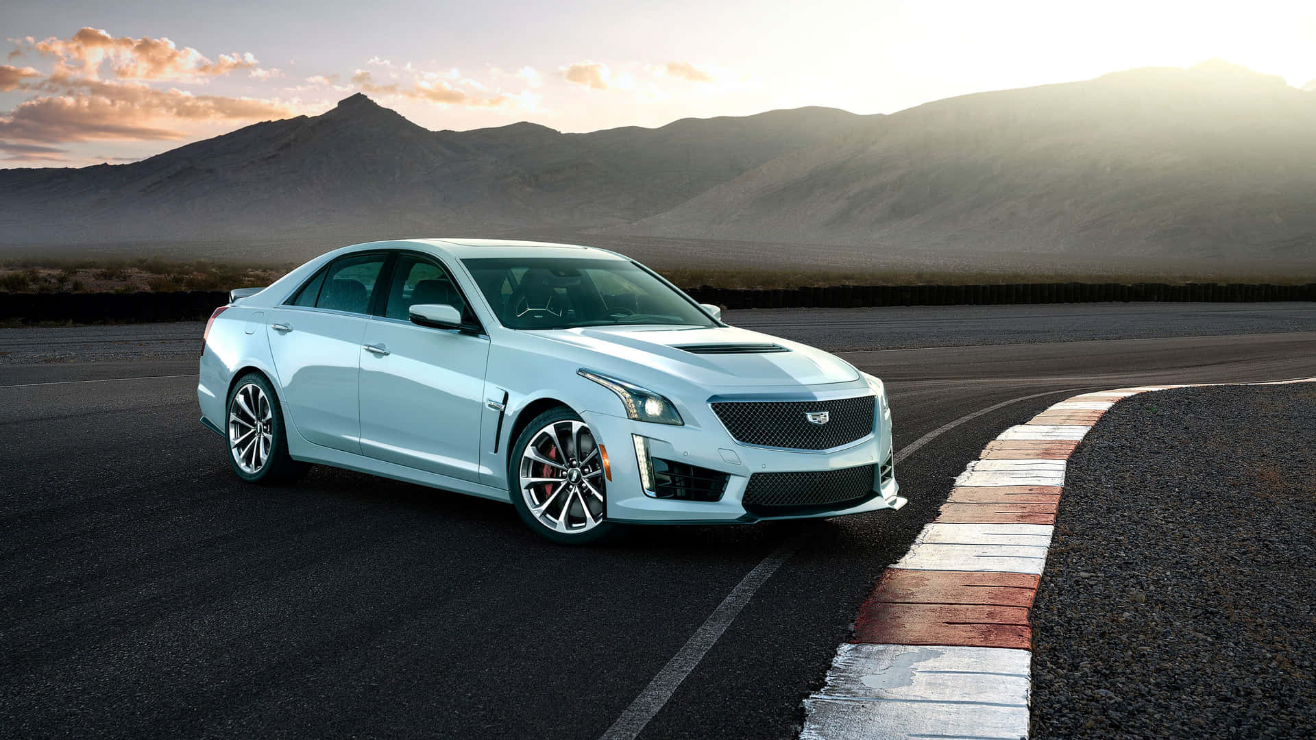 Sleek and Elegant Cadillac CTS on Open Road Wallpaper