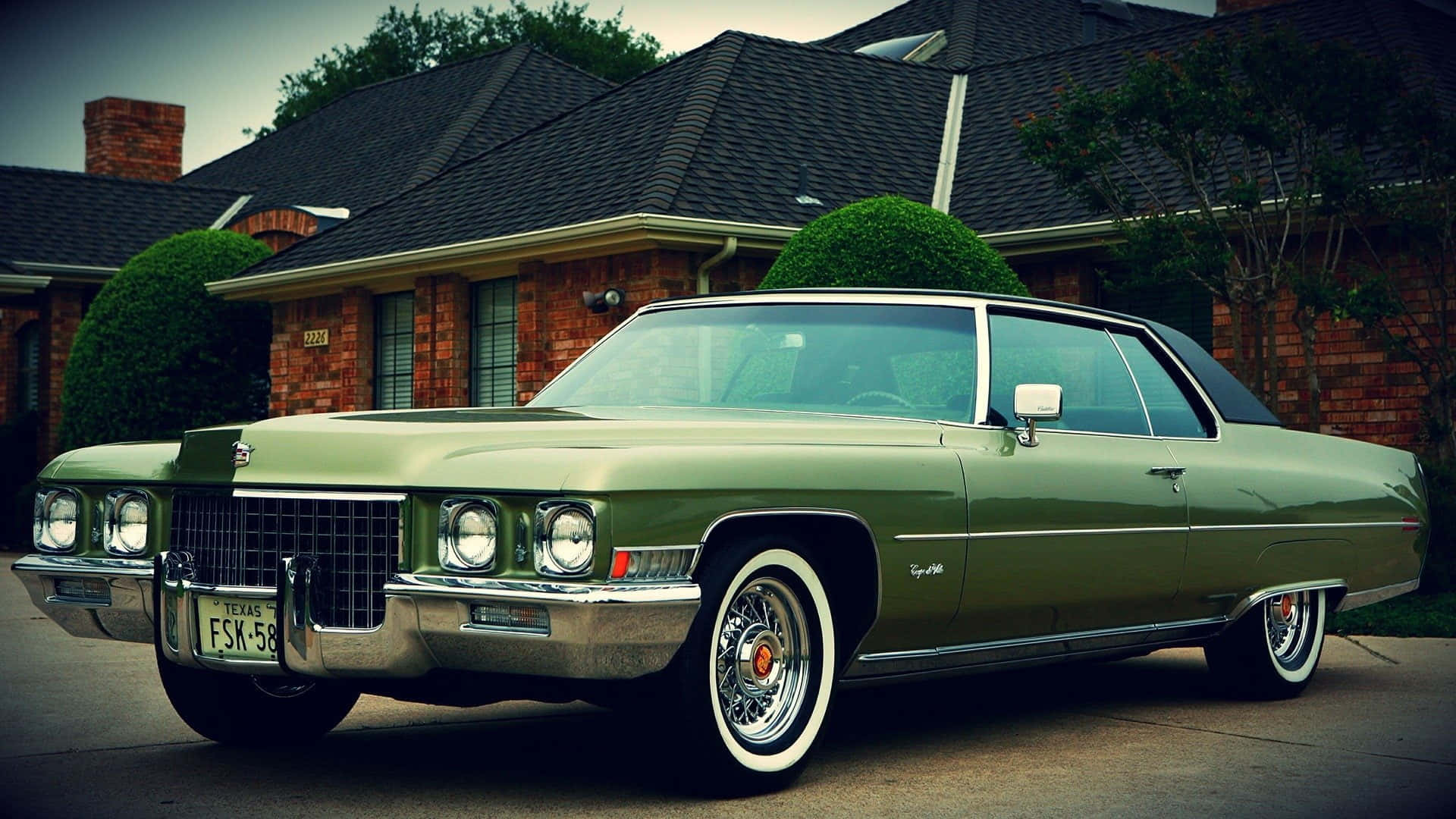 Classic Cadillac Deville in a Stunning View Wallpaper