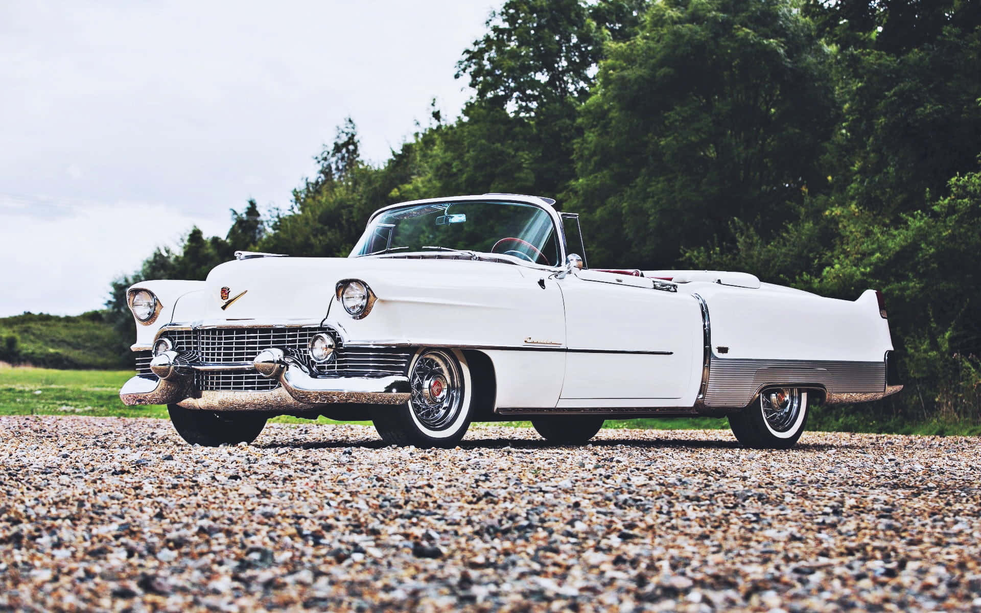Classic Cadillac Eldorado Driving in Style Wallpaper