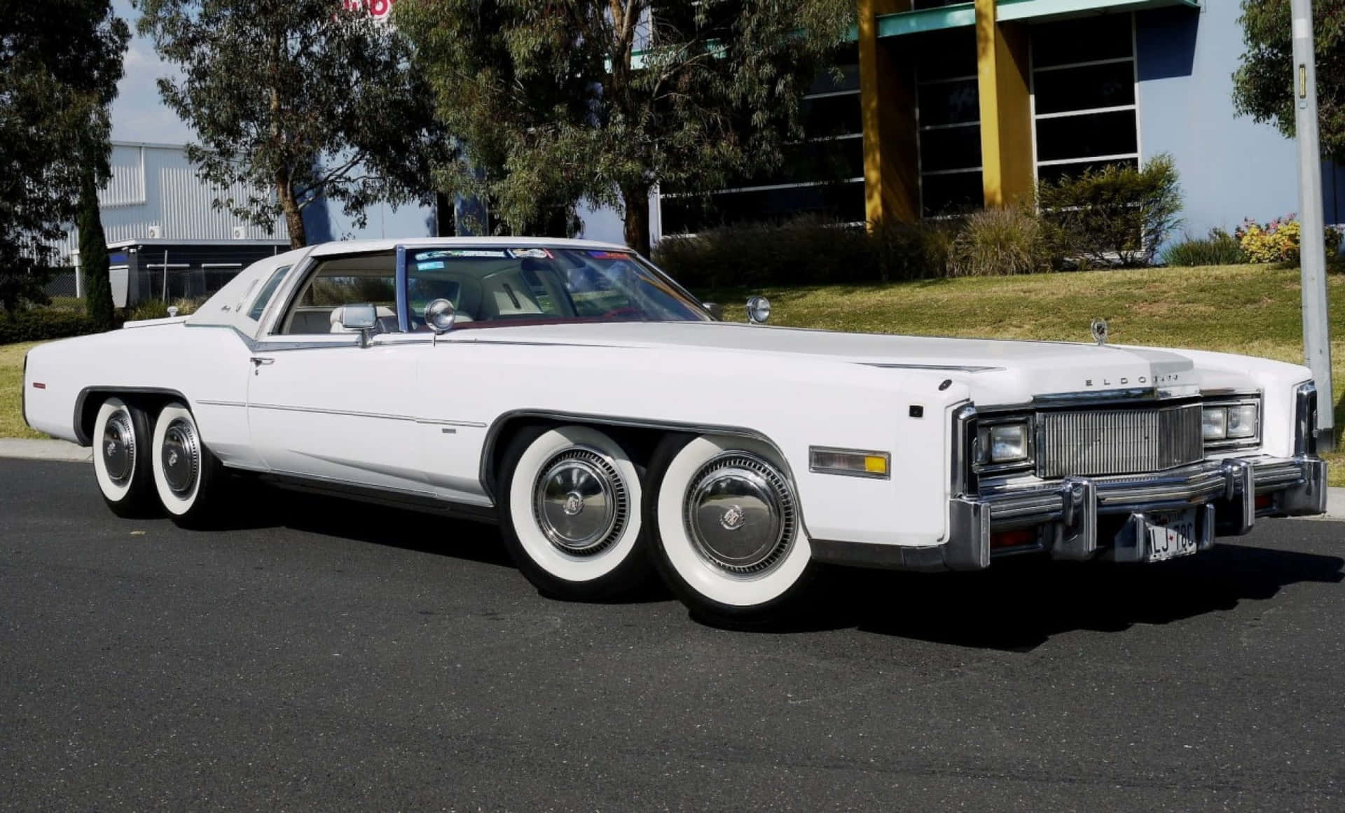 Majestic Cadillac Eldorado Cruising the Streets Wallpaper