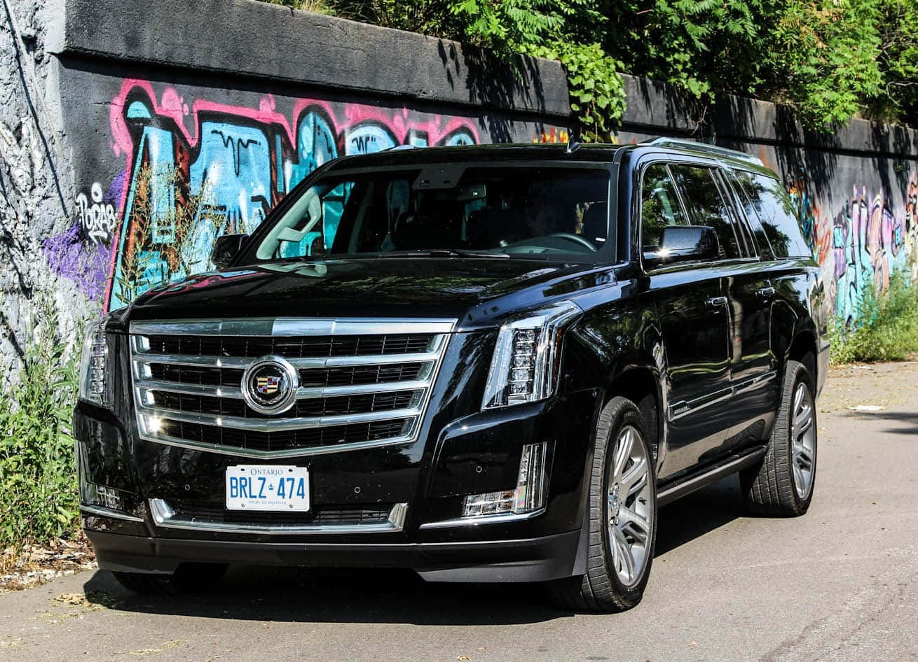Stunning Cadillac Escalade on the road Wallpaper